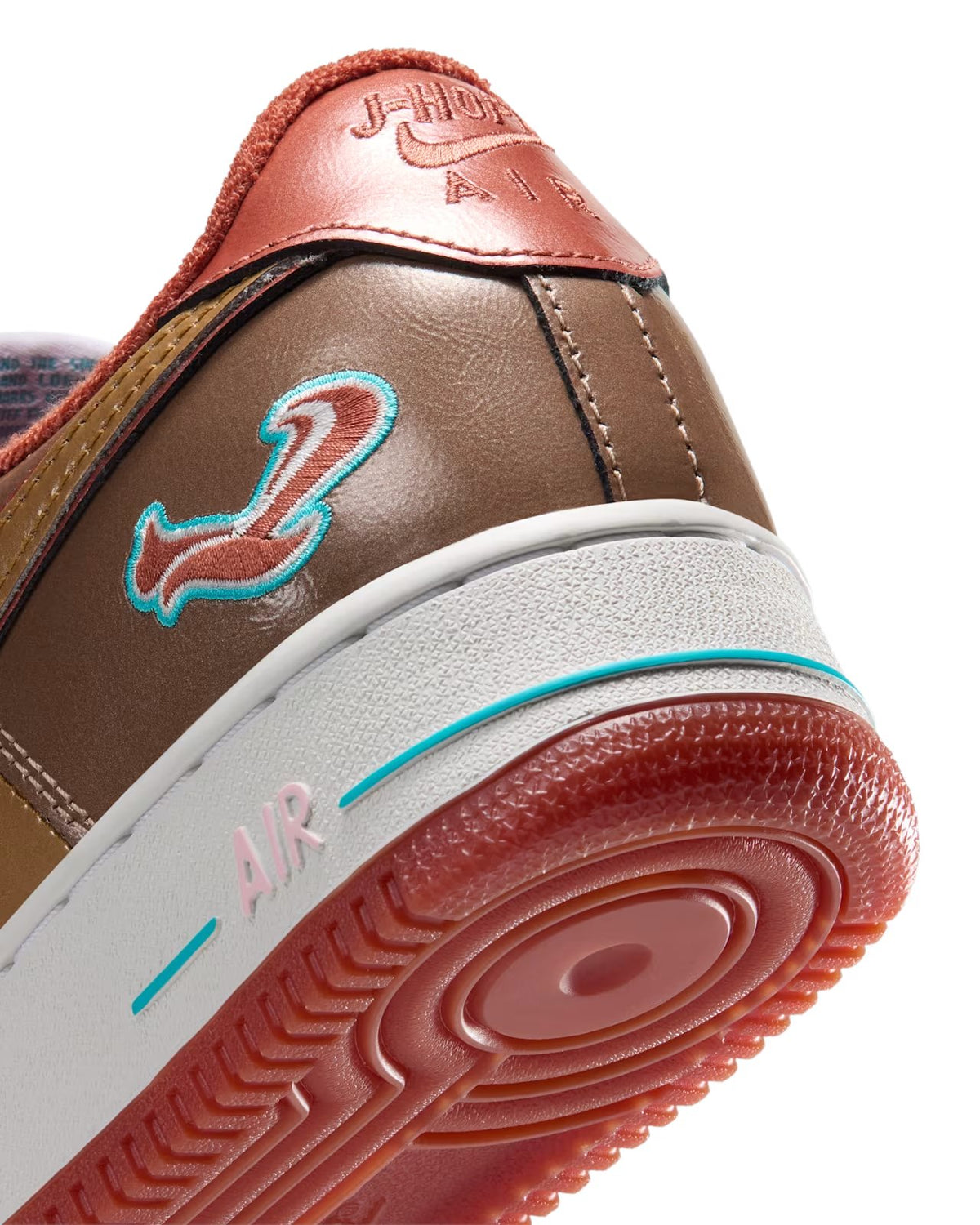 Close-up of the heel of 01 x Nigo x J-HOPE Nike Air Force 1 shoe showcasing unique branding and design details.