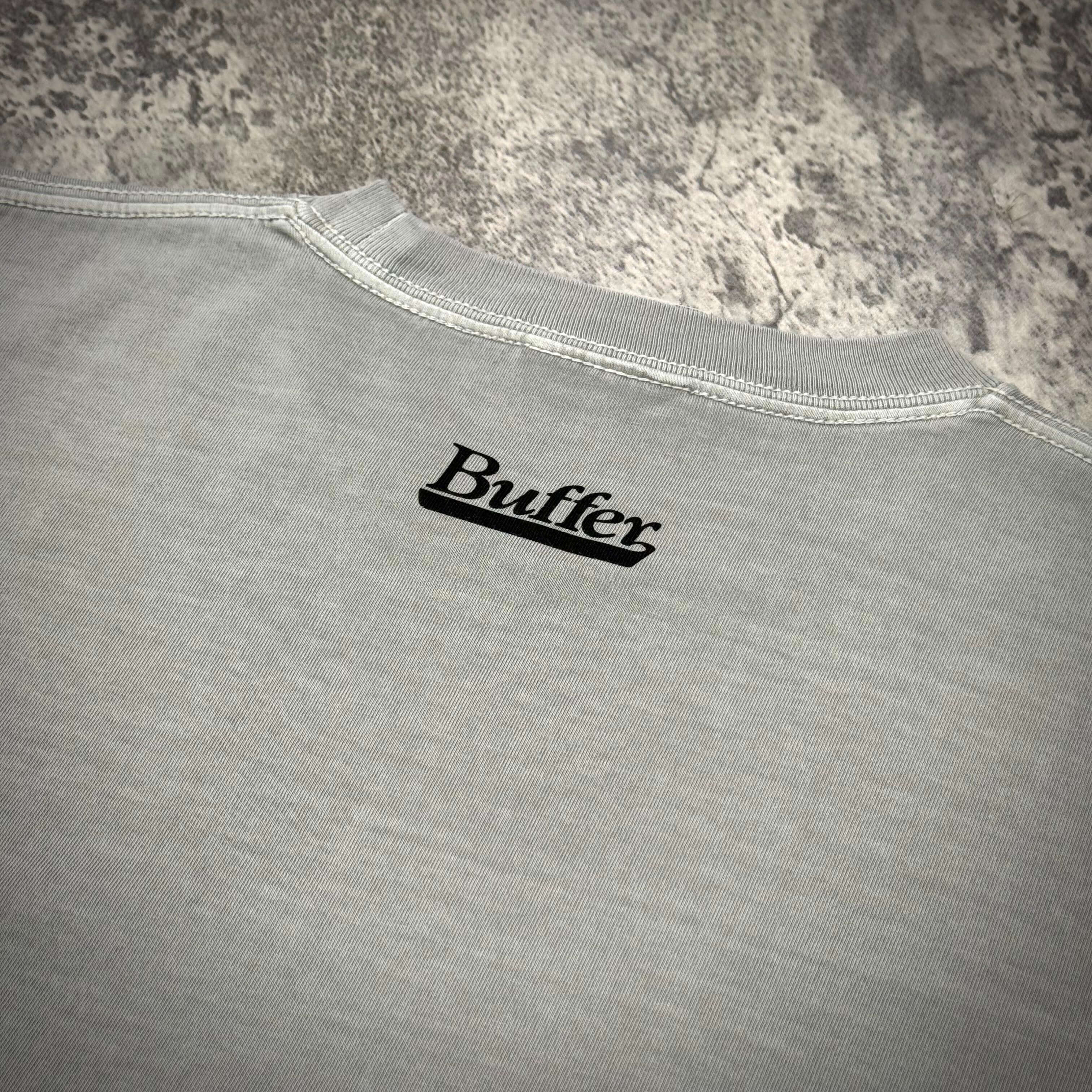 Back view of Buffer Groupie Tee showing the black logo on a light gray fabric.