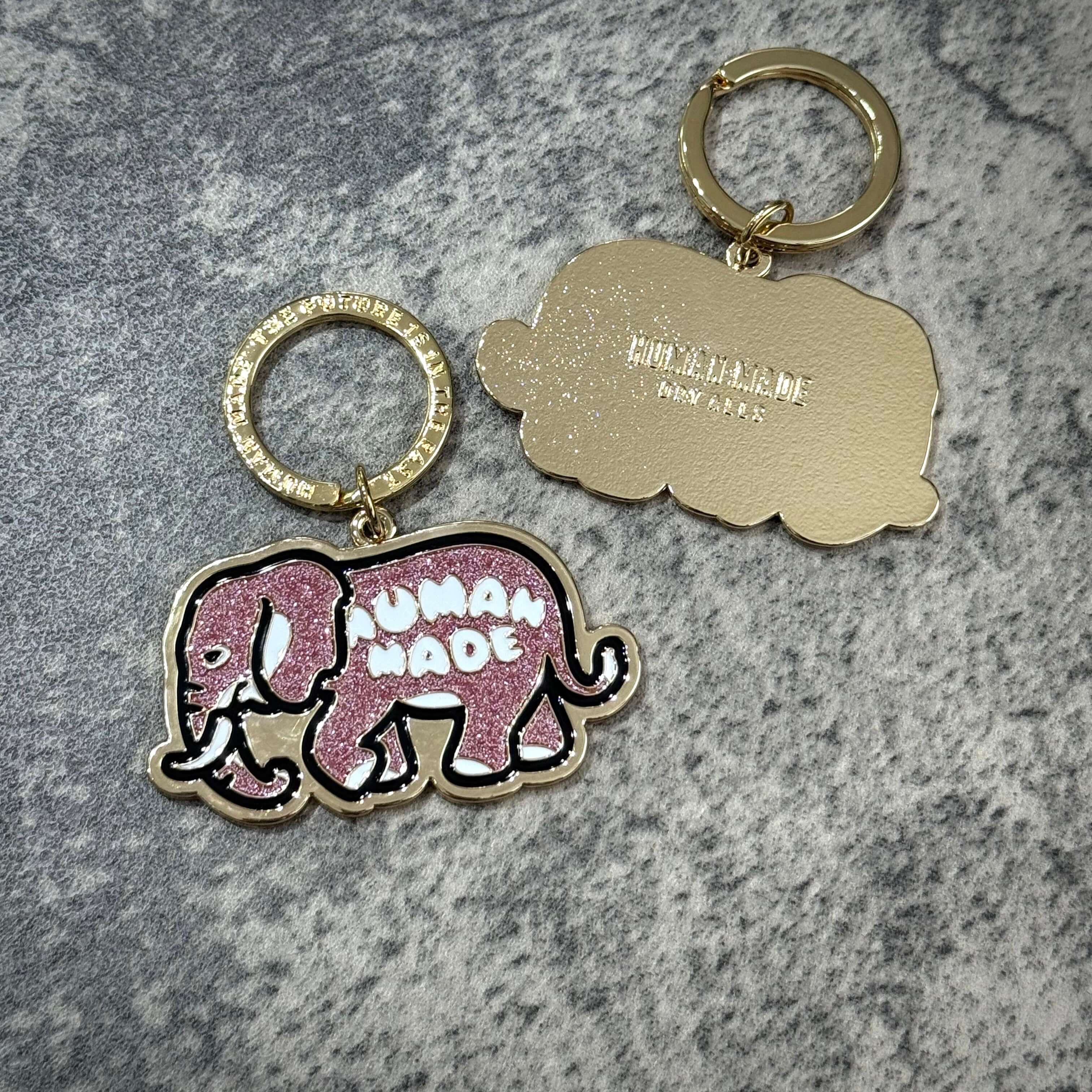 Human Made Bangkok Exclusive Elephant Keychain featuring a colorful elephant design and gold keyring.