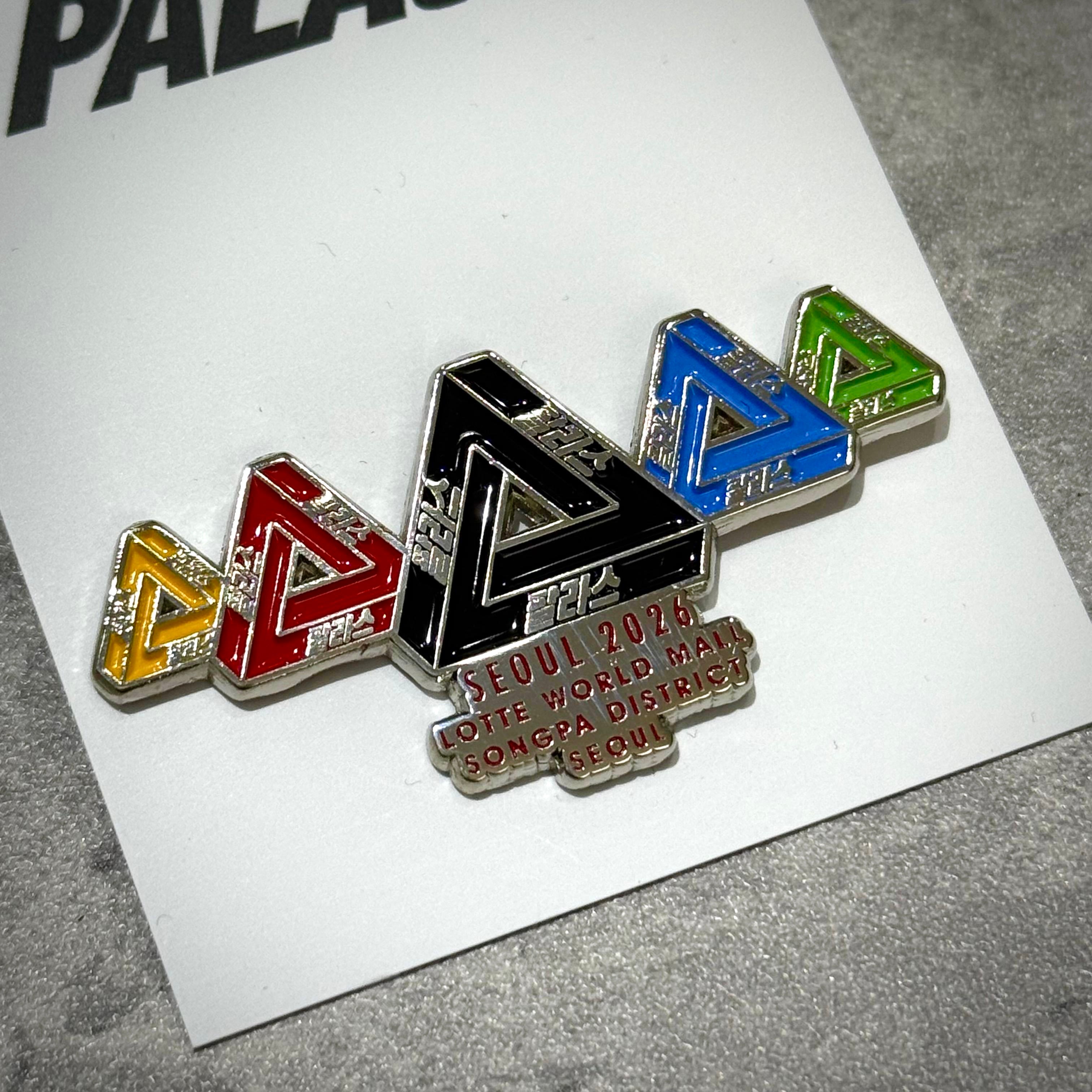 Palace Jamsil Exclusive Accessories pin featuring colorful triangle designs and the Seoul 2026 logo.