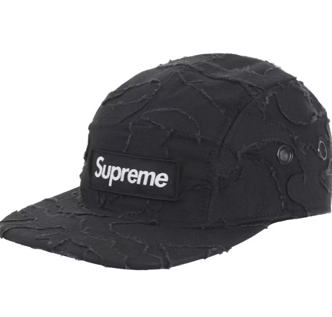Supreme Layered Camo Camp Cap featuring a distressed black design and signature Supreme logo patch on the front.