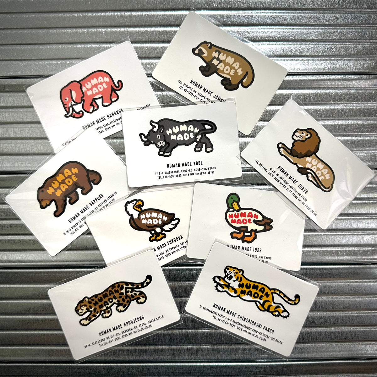 Human Made Store Exclusive Fridge Magnet featuring various animal designs and logos.