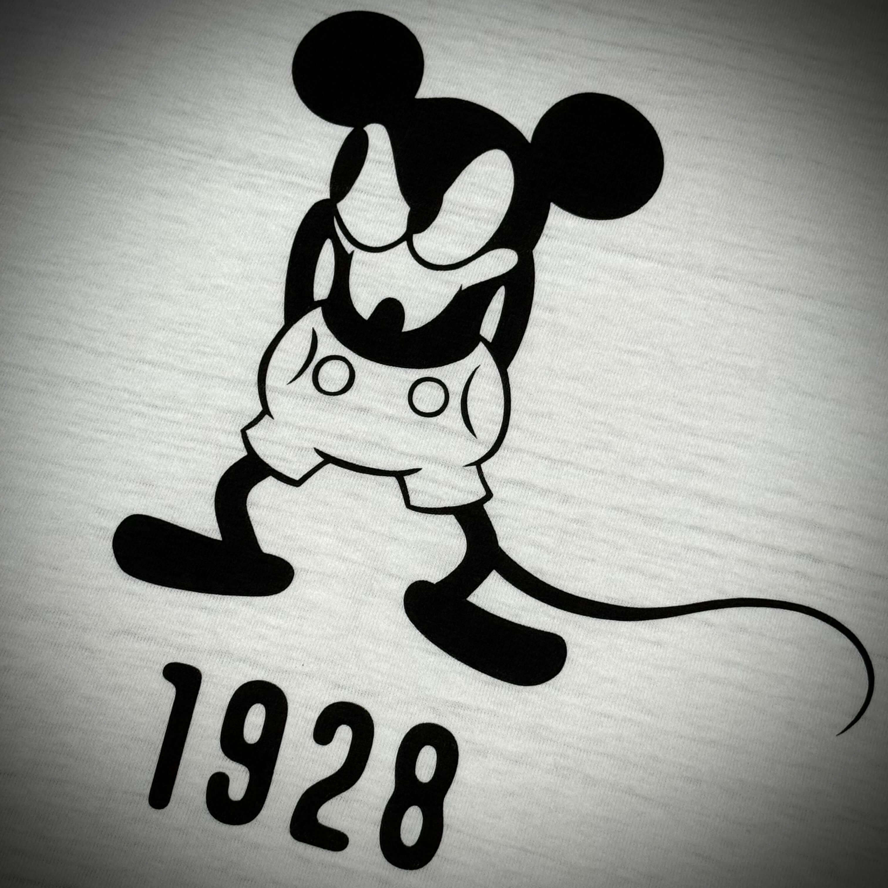Human Made 1928 Disney Mickey graphic design with vintage Mickey Mouse character and 1928 text.