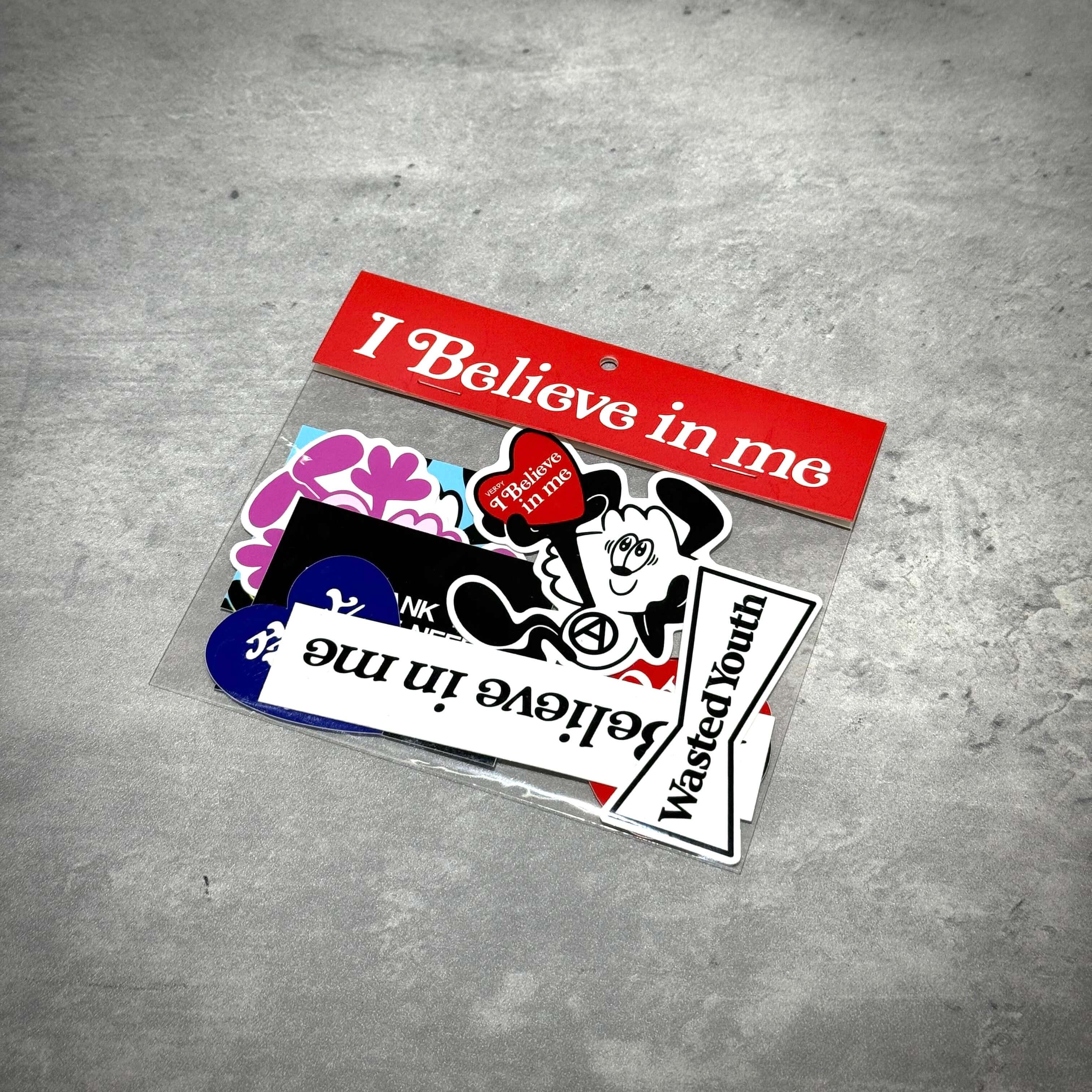 Variety of colorful stickers including 'I Believe in me' in a clear packaging.