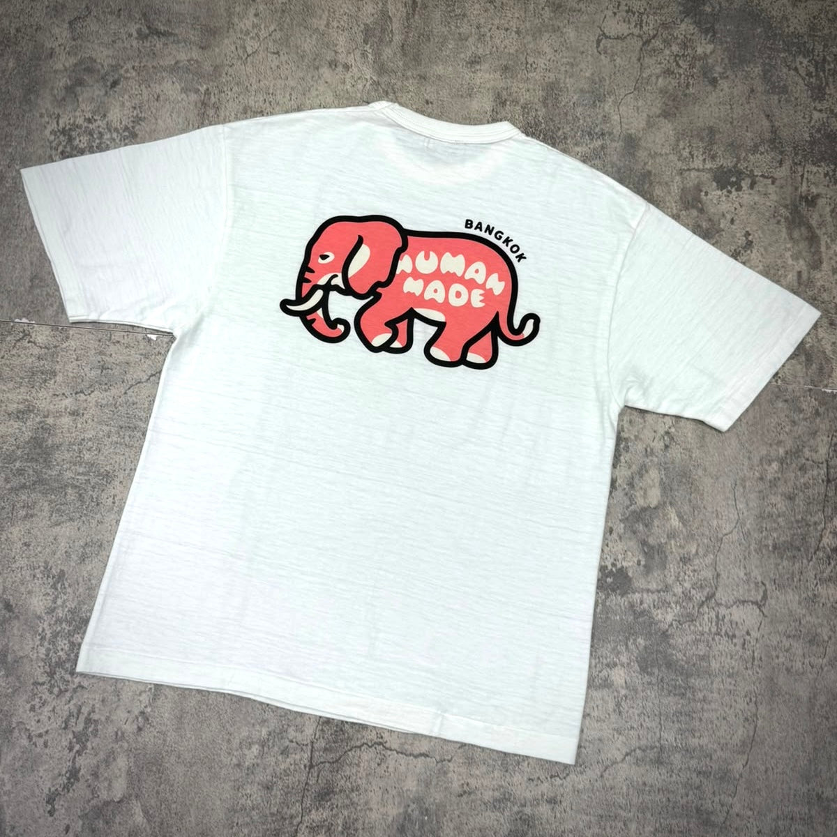 Human Made Bangkok Exclusive Elephant Back Logo Tee showing a cartoon elephant design on the back.