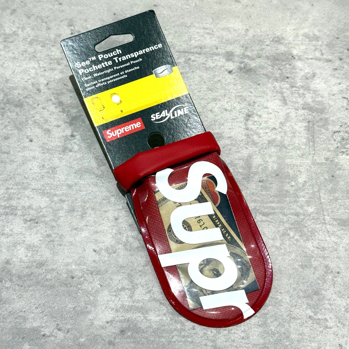 Supreme SealLine See Pouch Small Red packaging with transparent pocket and branding.
