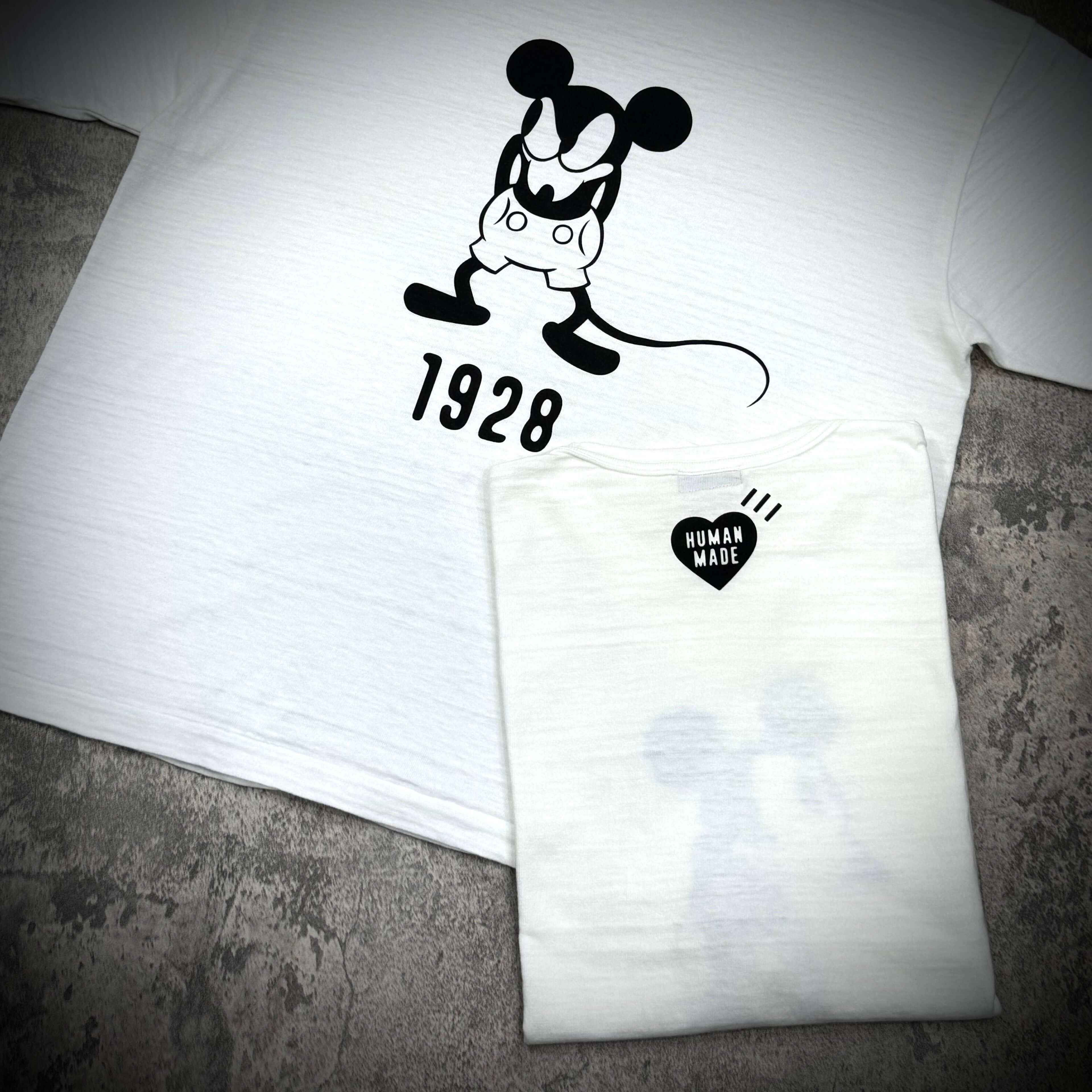 Human Made 1928 Disney Mickey Graphic Tee featuring a classic Mickey Mouse design in black on white.