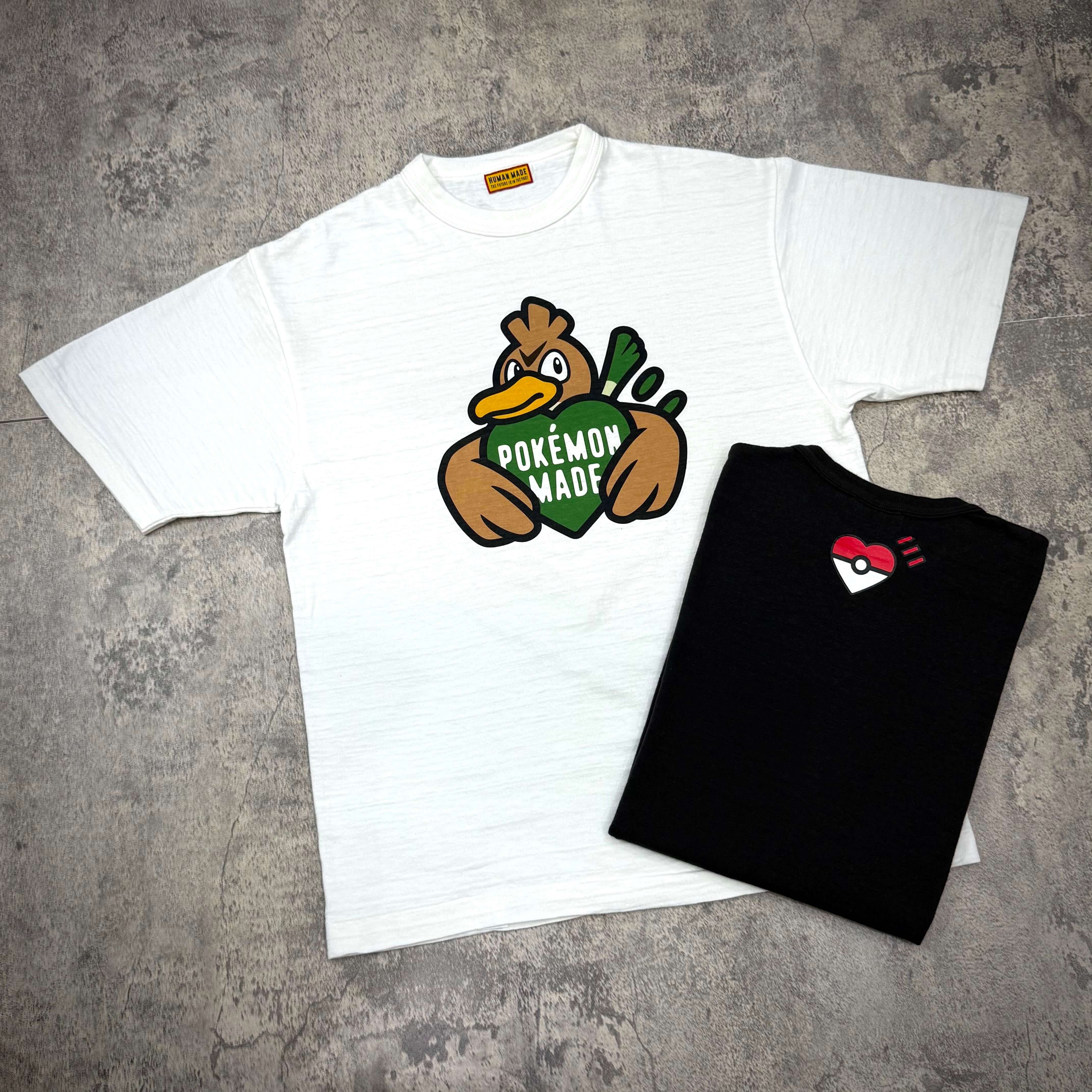 Human Made x Pokemon Graphic Tee #2 featuring colorful design on white background and black tee laid flat.