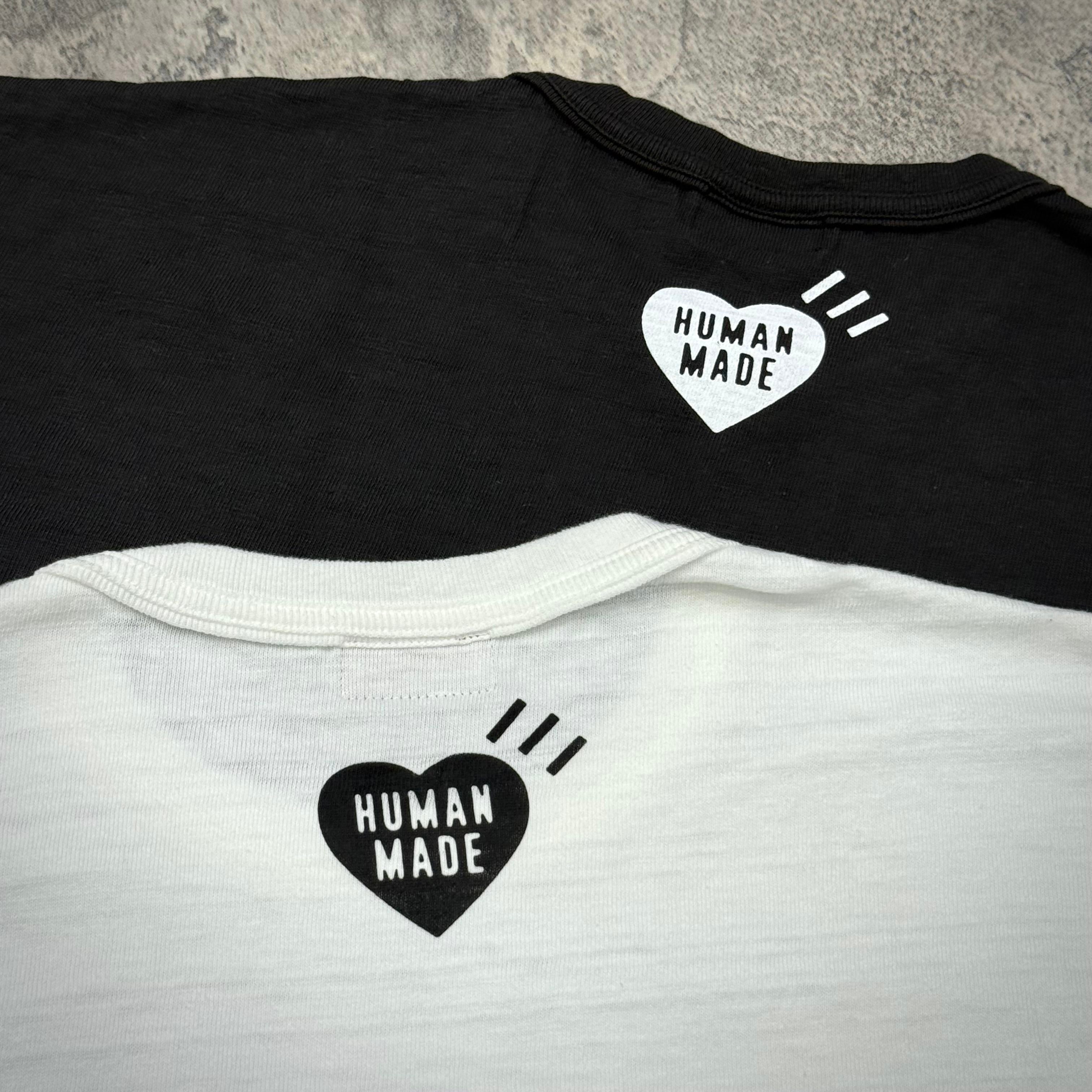 Human Made Jamsil Exclusive Raccon Tee featuring logo on black and white t-shirts.