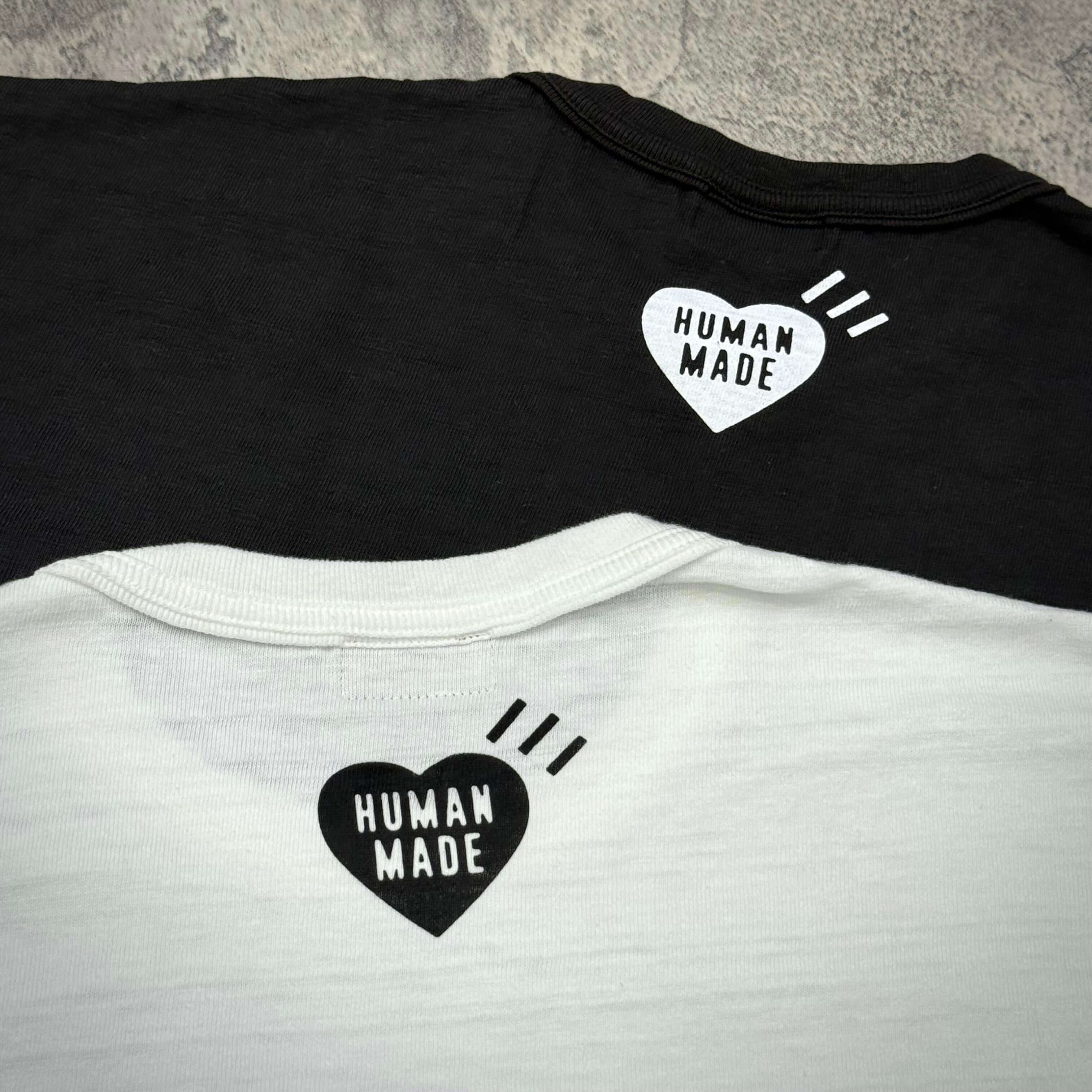 Human Made Jamsil Exclusive Raccon Tee featuring logo on black and white t-shirts.