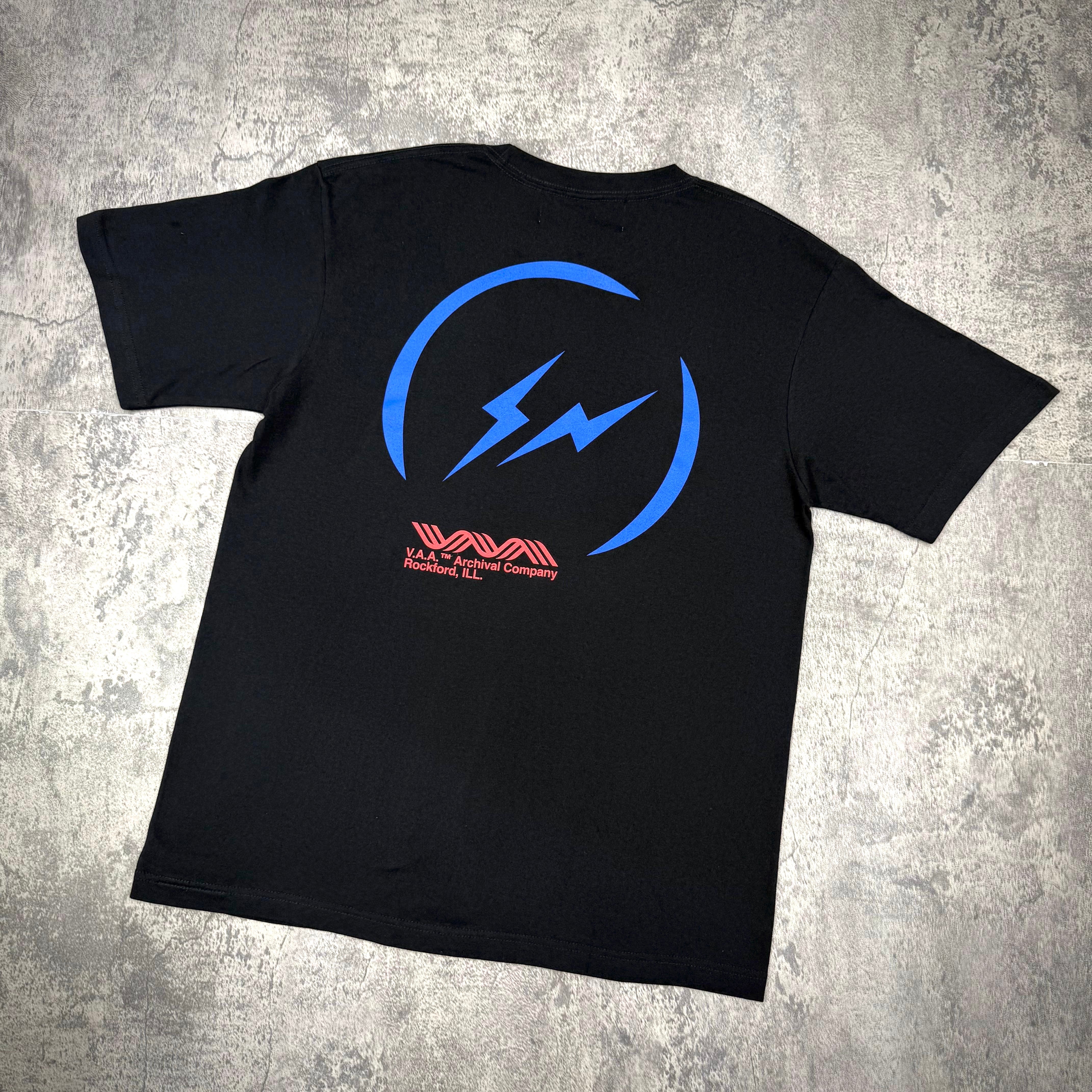 Fragment Design x Virgil Abloh Archive Logo Tee featuring a blue lightning design on a black tee, VA Tokyo Exclusive.