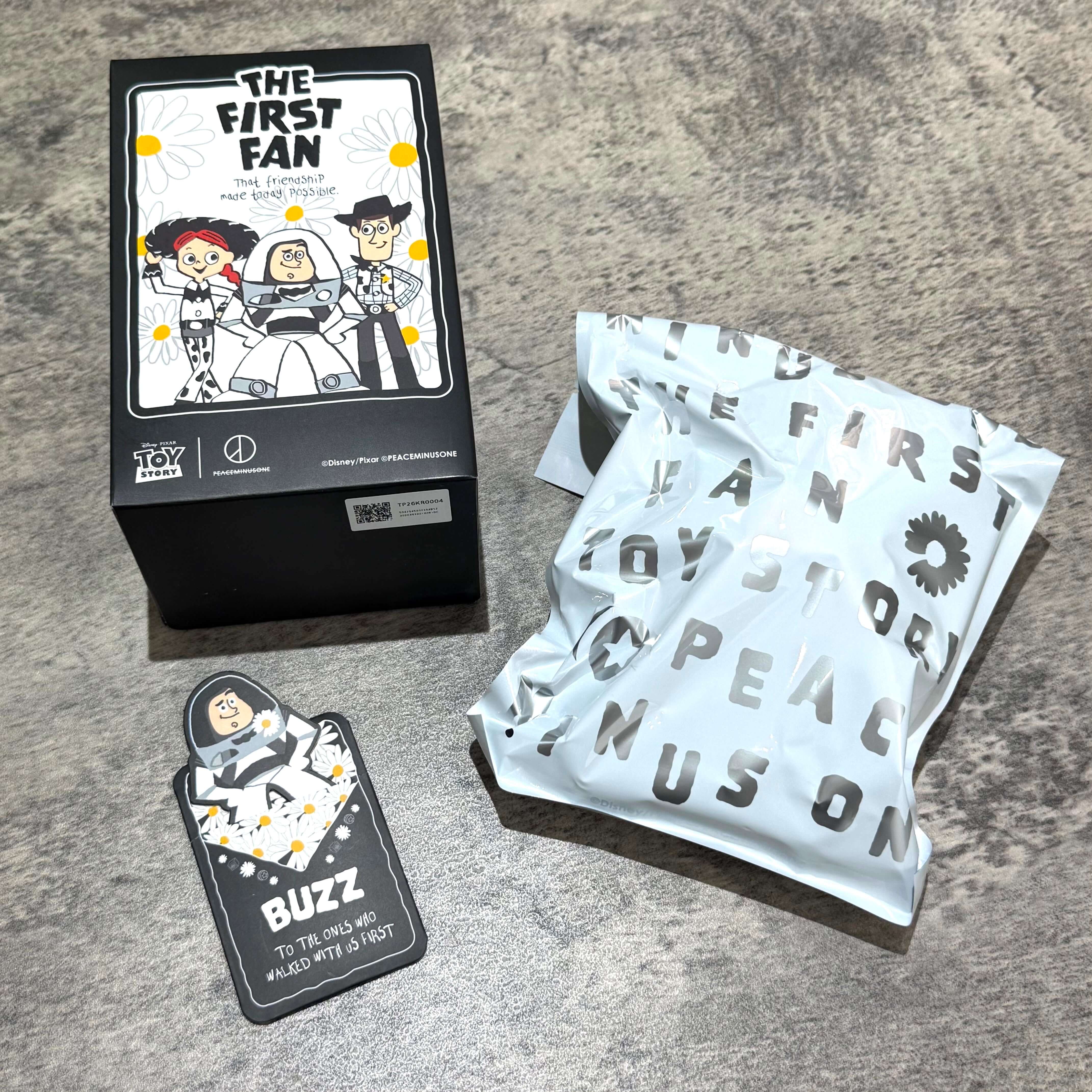 PEACEMINUSONE x Toy Story The First Fan - packaging, Buzz tag and blind box key ring display