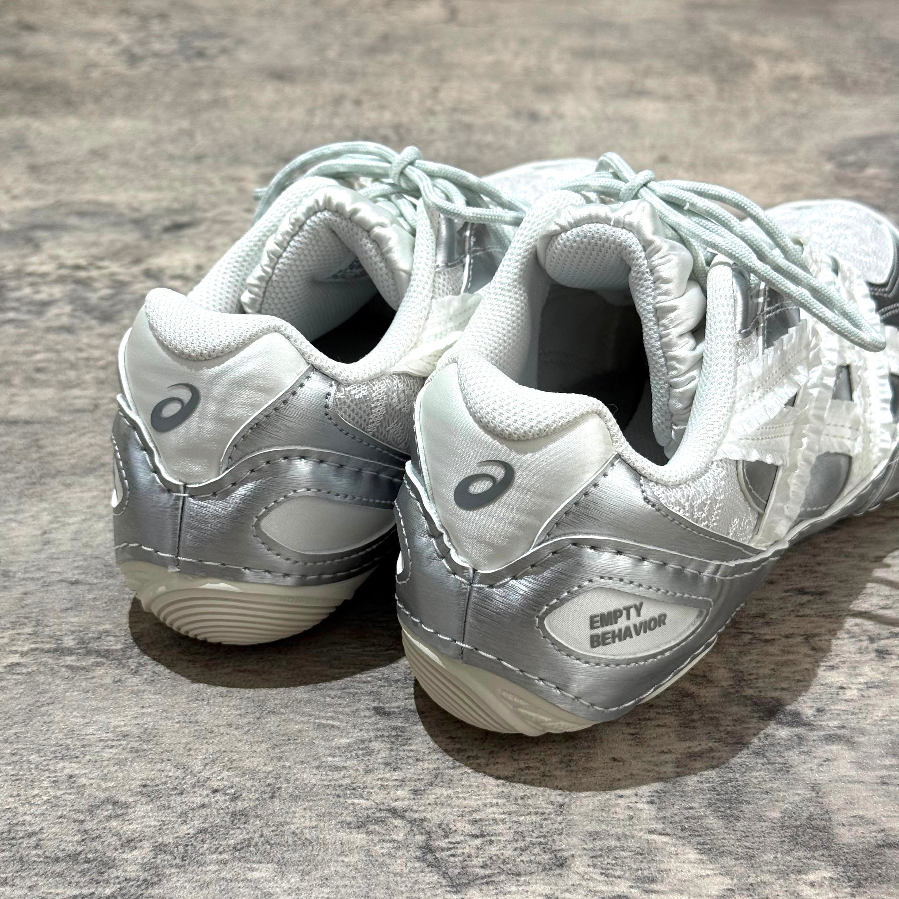 Asics x Empty Behavior Hypersync in Pure Silver White with Empty Behavior logo on the heel.
