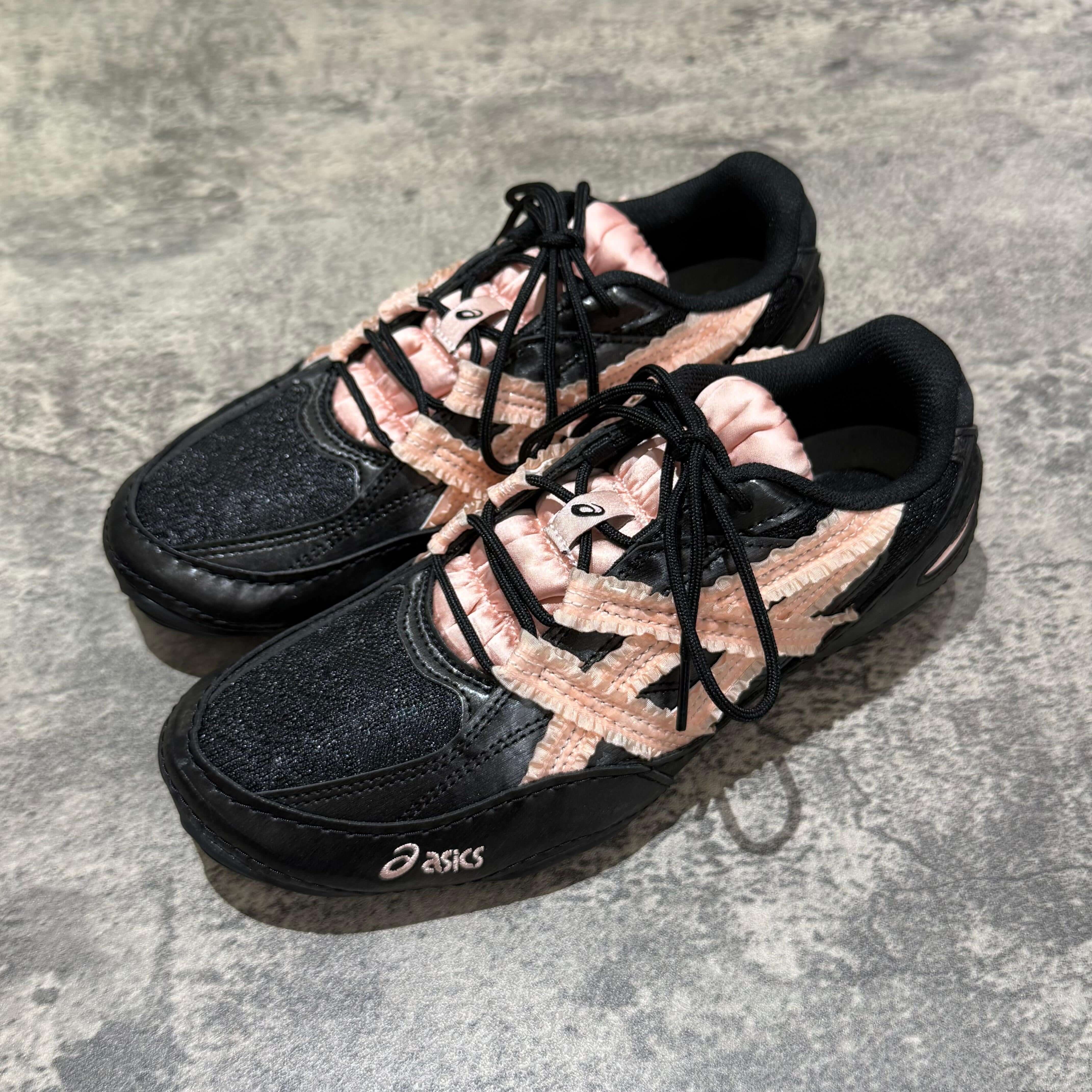 Asics x Empty Behavior Hypersync - Black Breeze sneakers featuring a black and pink colorway.