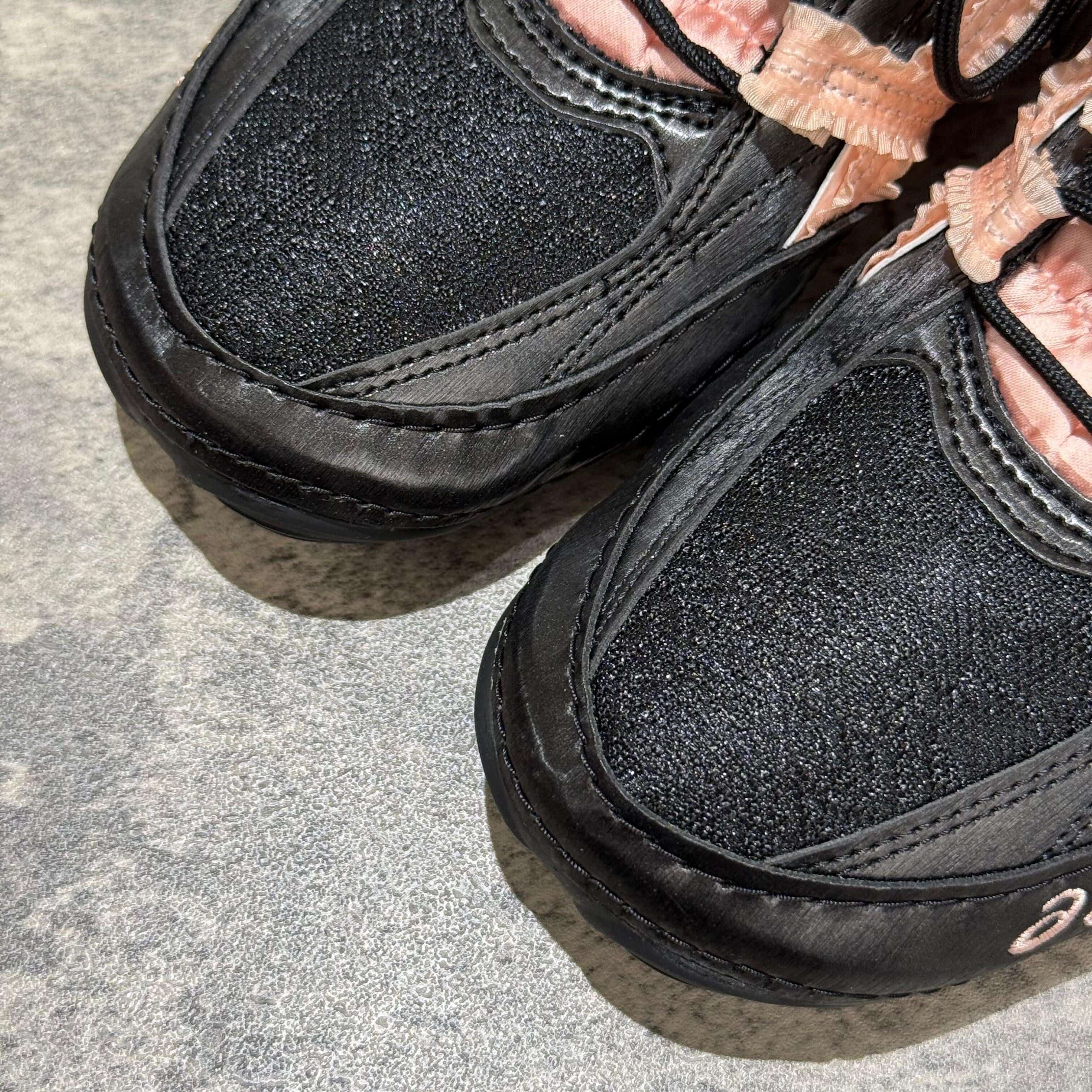 Asics x Empty Behavior Hypersync - Black Breeze close-up of sneaker design showcasing black and pink details