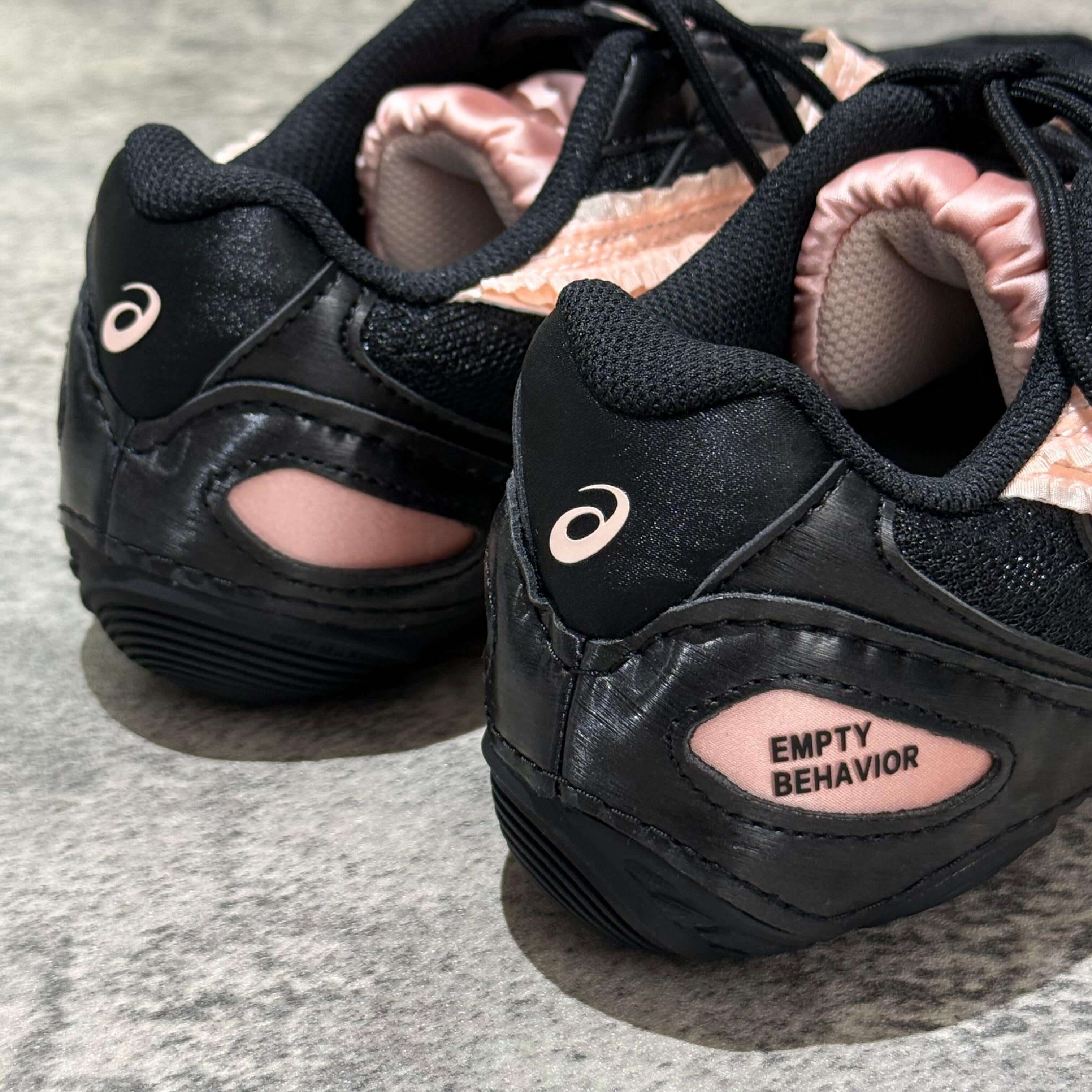 Asics x Empty Behavior Hypersync - Black Breeze sneakers showcasing black and pink design with 'EMPTY BEHAVIOR' branding.