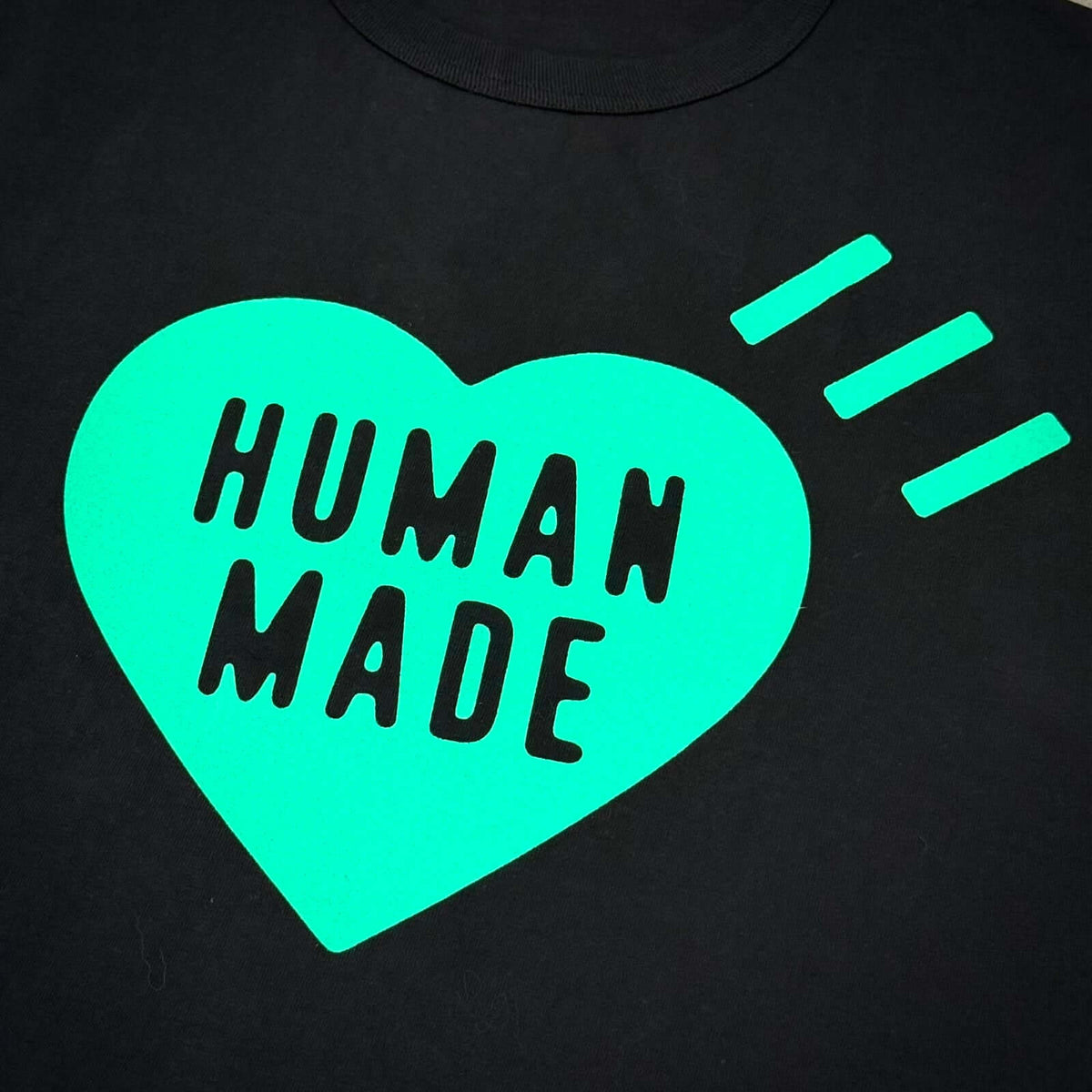 Human Made Bangkok Exclusive Heart Logo Tee design featuring a bold heart and striking typography.