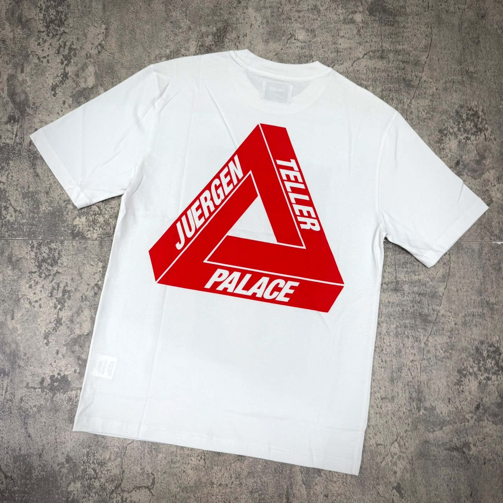 Palace Juergen Teller Tee 2 - White featuring a bold red graphic design on the back.