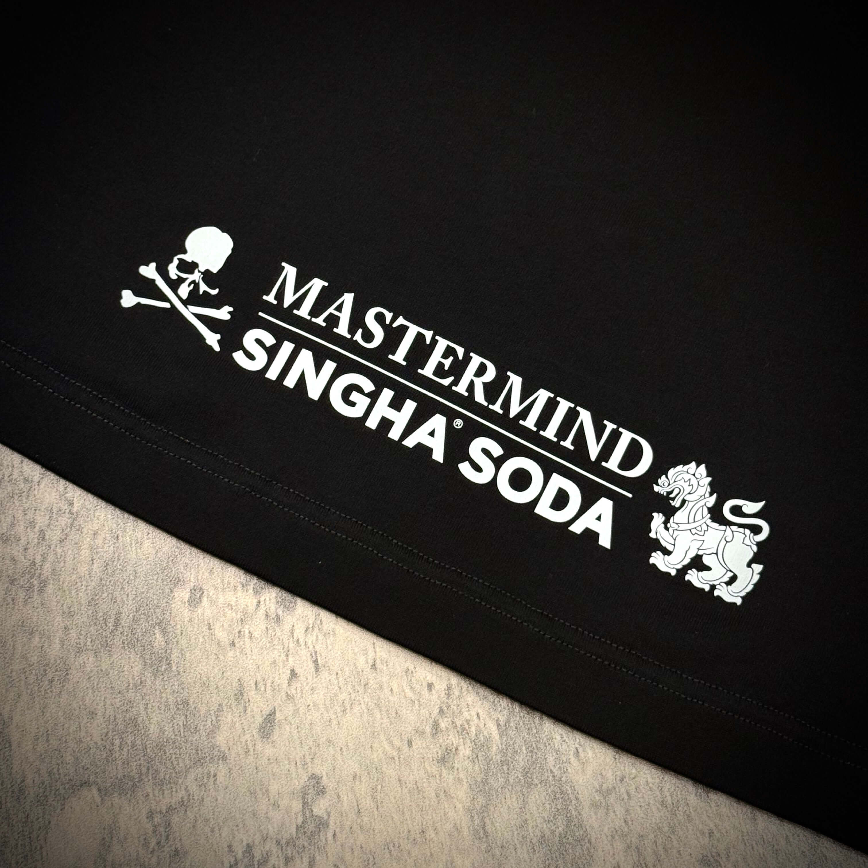 Singha Soda x Mastermind World SS Tee #2 featuring distinctive logo and design on a black t-shirt.