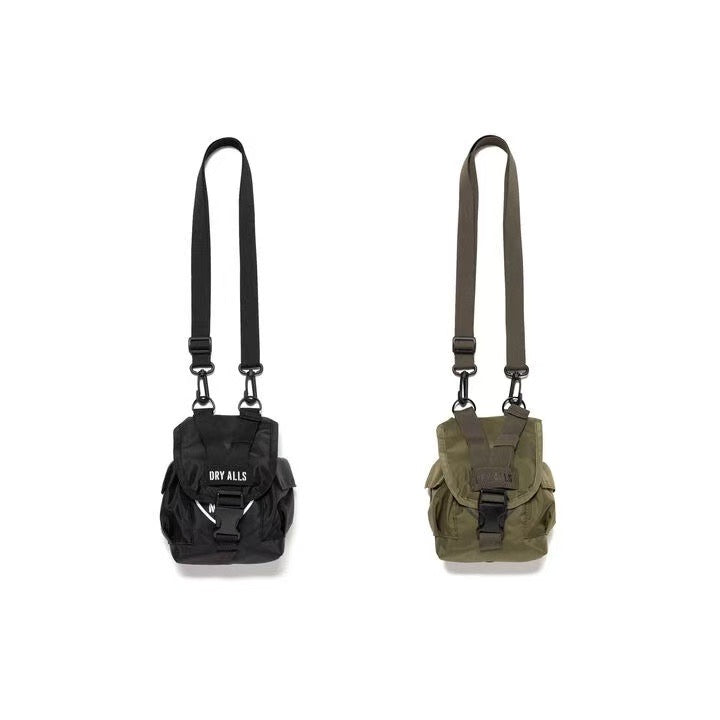 Human Made Military Multi Pouch in black and olive green, showcasing its versatile design and adjustable straps.