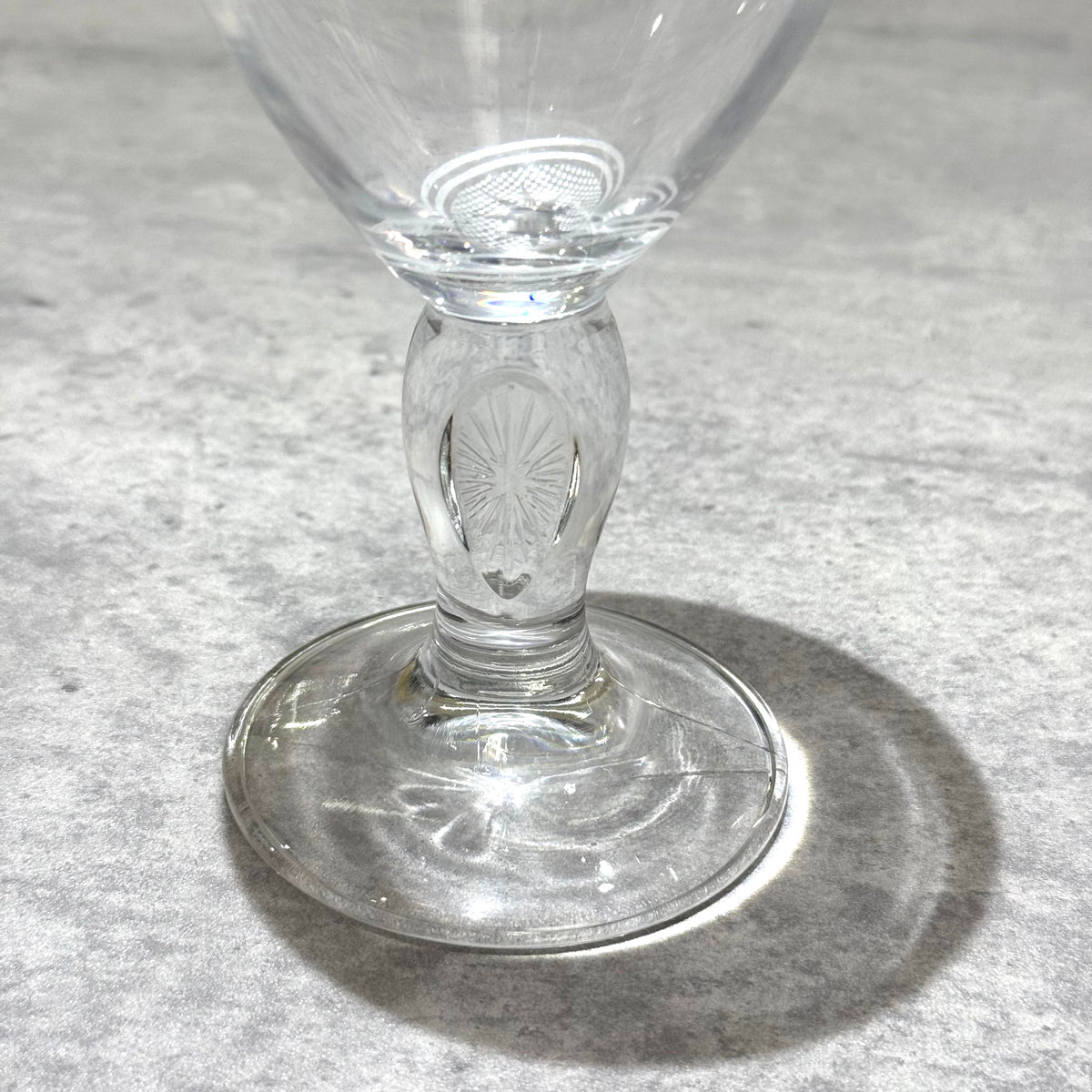 Palace x Stella Artois 500ML Pint Chalice - Clear glass bottom showcasing detailed design.