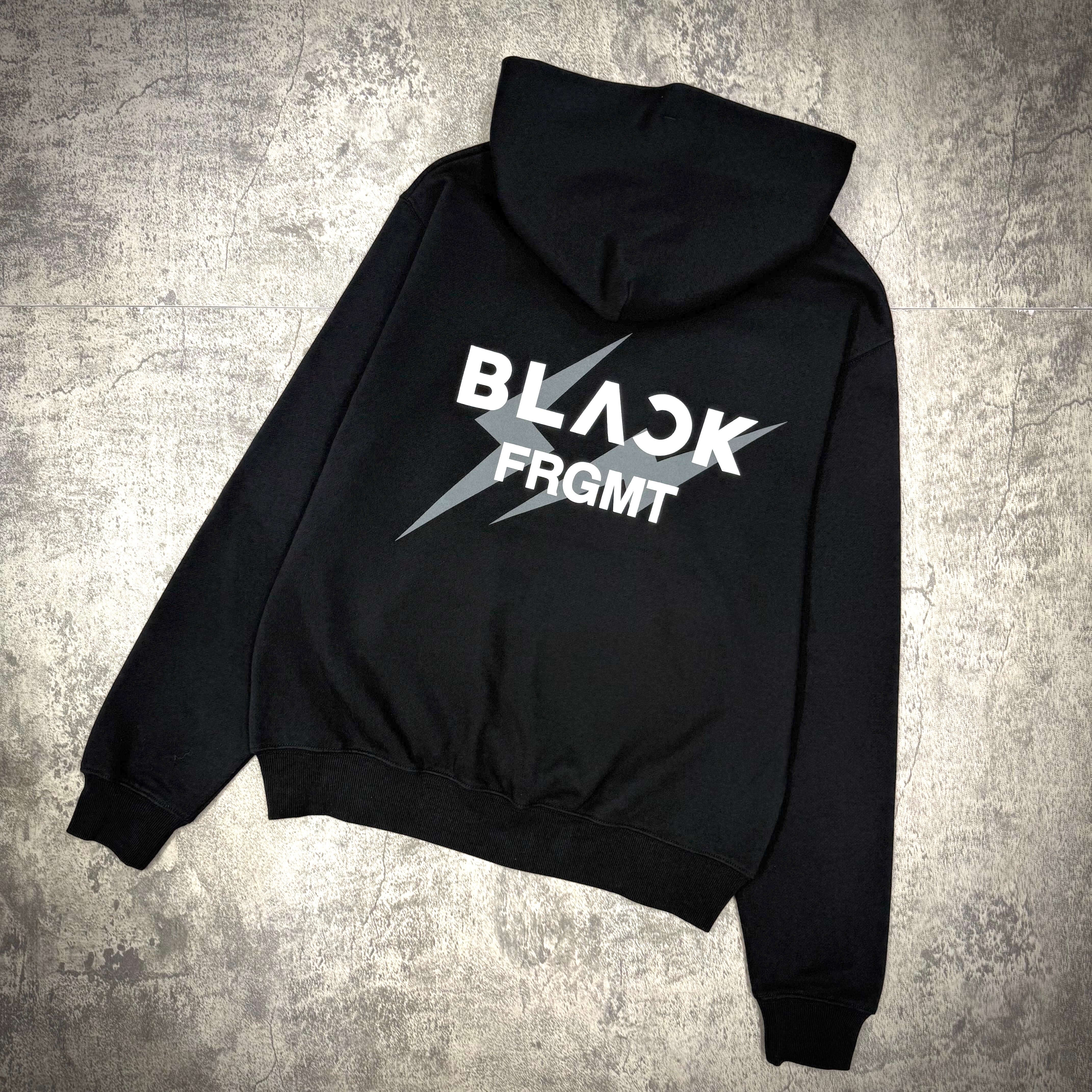 Fragment x Blackpink BLACKFRGMT hoodie featuring bold logo on a black background.