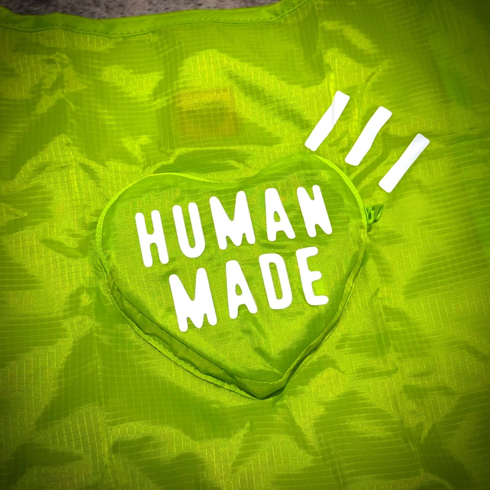 Human Made Heart Shopping Bag with bright green background and bold white lettering.