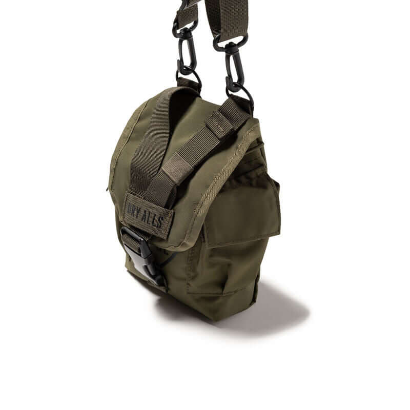 Human Made Military Multi Pouch HM32GD009 in olive green with adjustable strap and buckle detail.