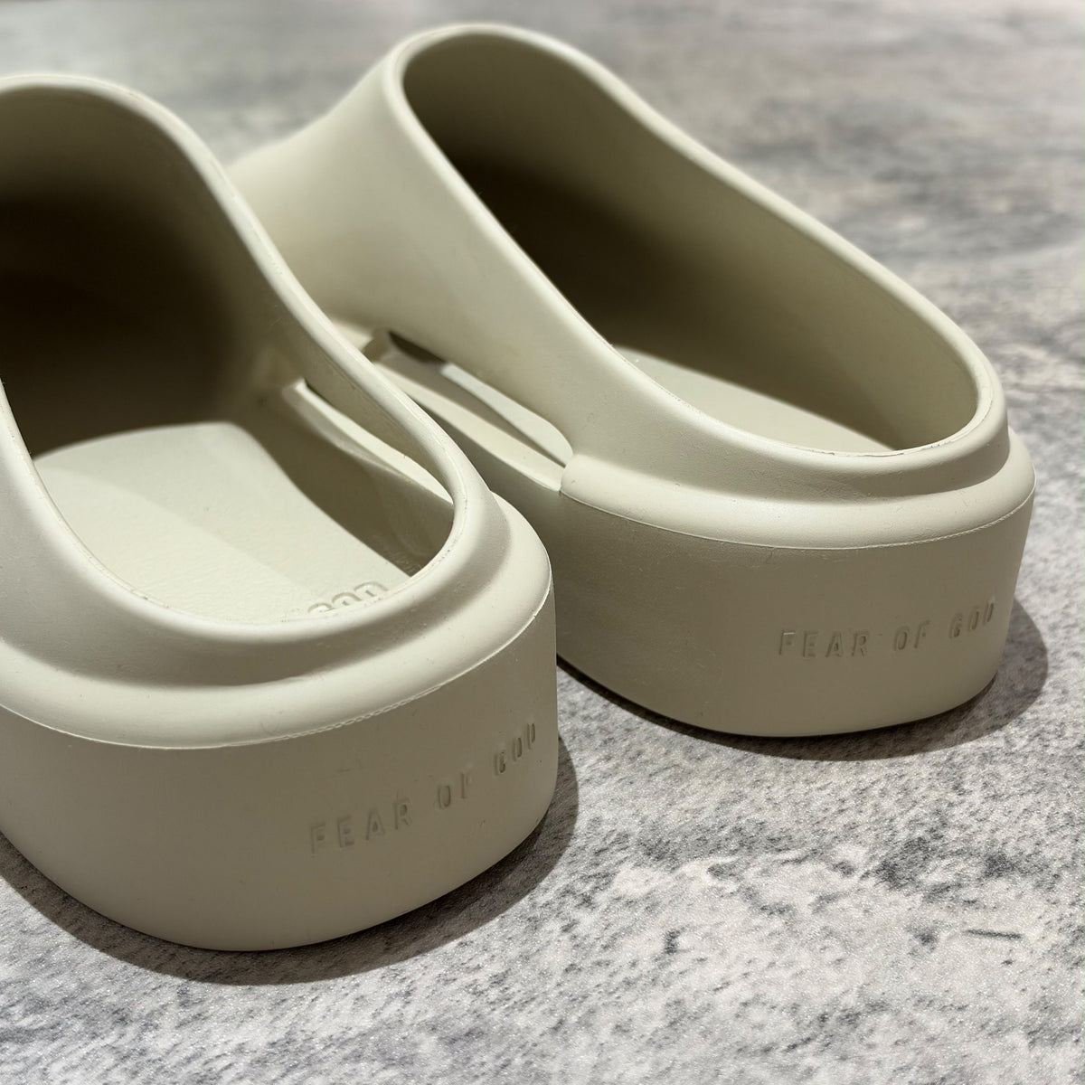 Fear of God The California Slip-on Oat FG80-100EVA side view displaying the sculptural minimalism of the footwear.