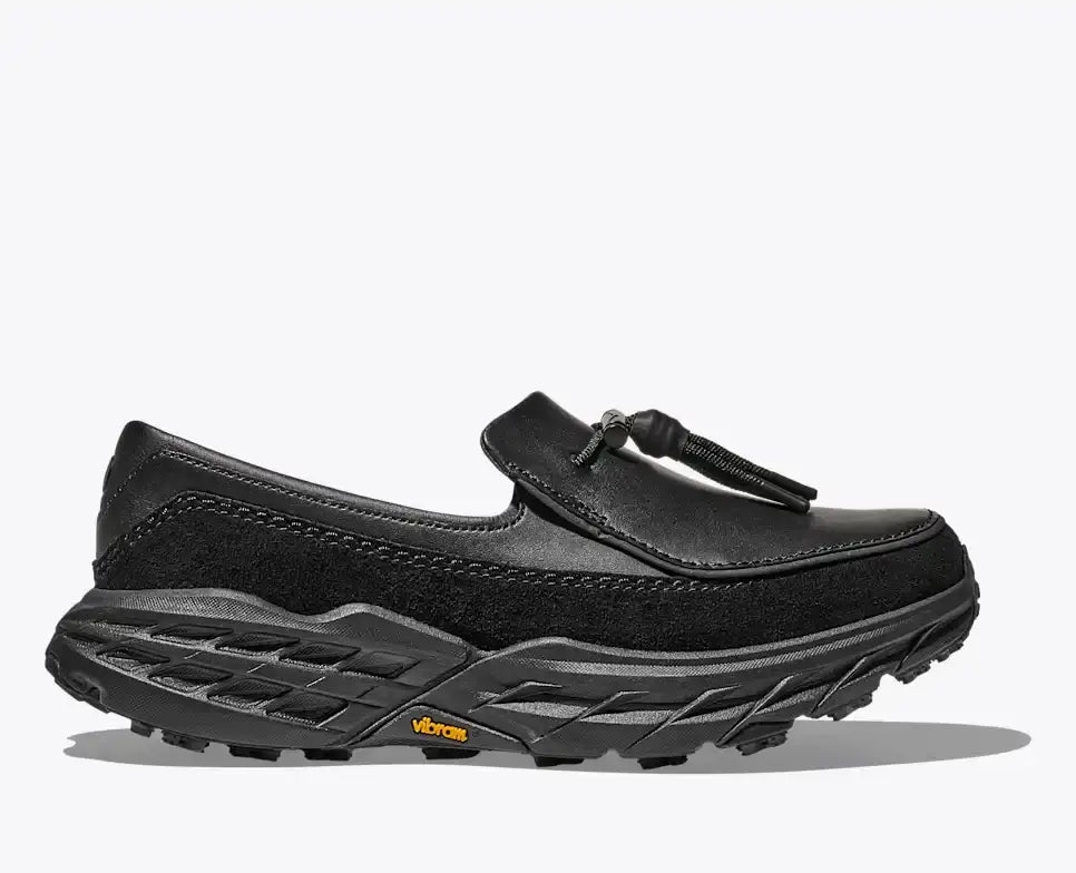 Hoka Speed Loafers - Black 1162170-BBLC side view showcasing sleek design and Vibram outsole.