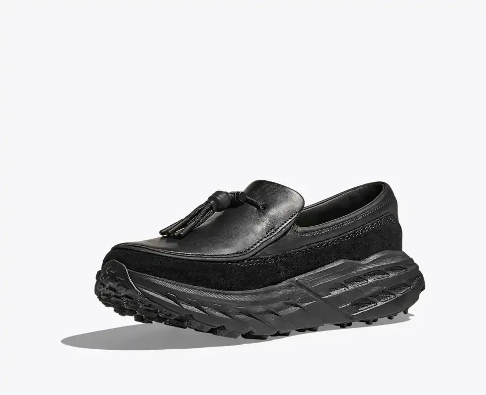 Hoka Speed Loafers - Black 1162170-BBLC side view showcasing the sleek design and trail-engineered sole.