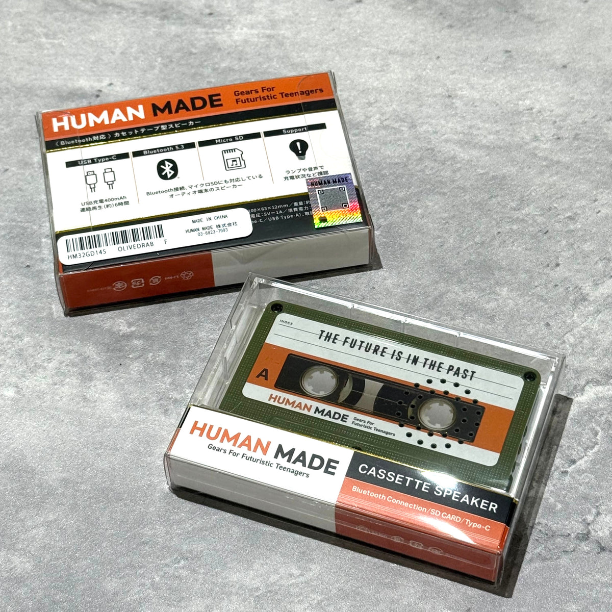 Human Made Cassette Speaker packaging showcasing retro design and Bluetooth connection.