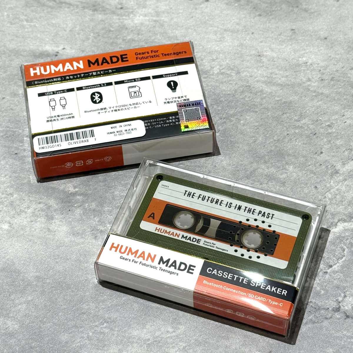 Human Made Cassette Speaker packaging showcasing retro design and Bluetooth connection.