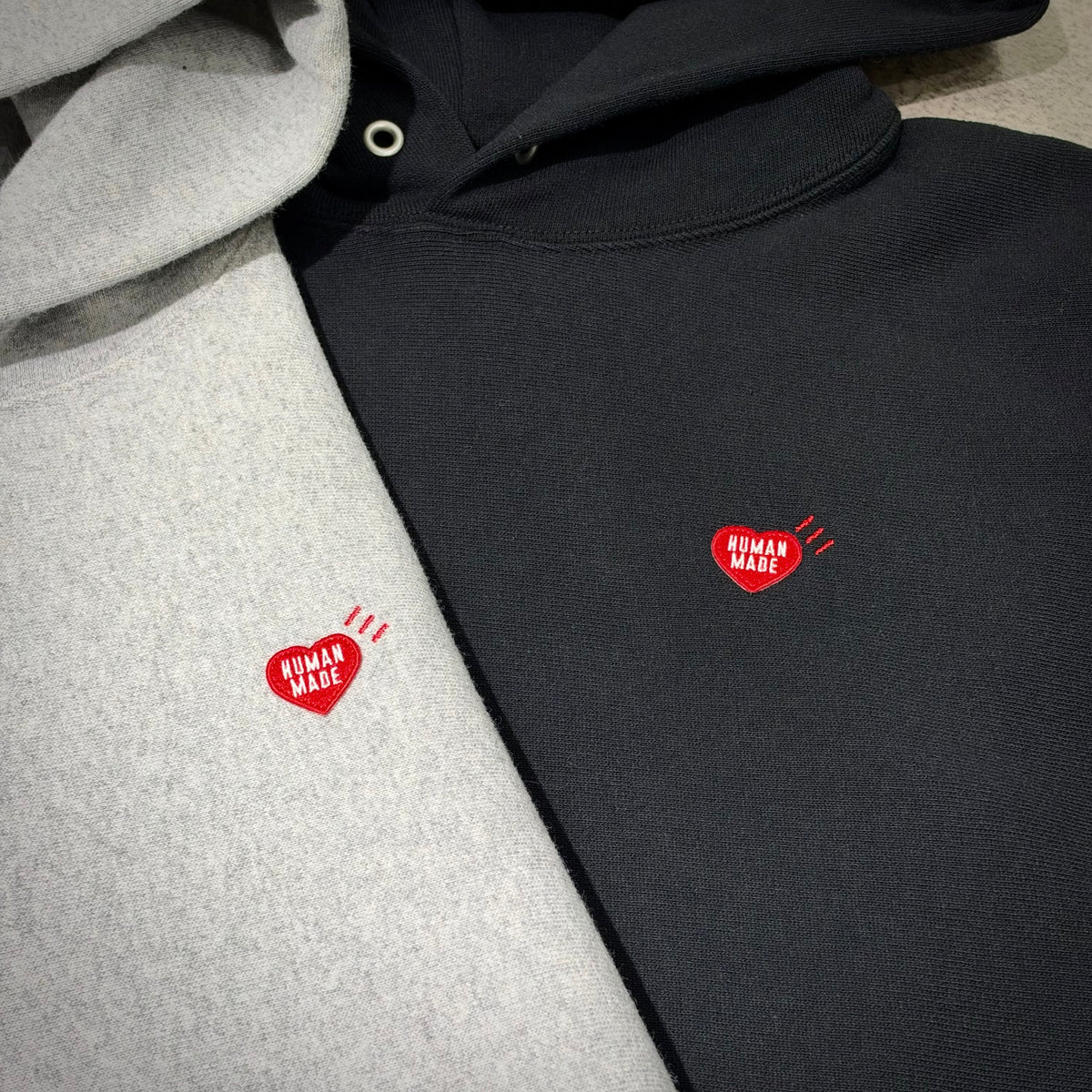 Human Made Shinsaibashi Exclusive Tiger Heavyweight Hoodie in gray and black with red heart logo.