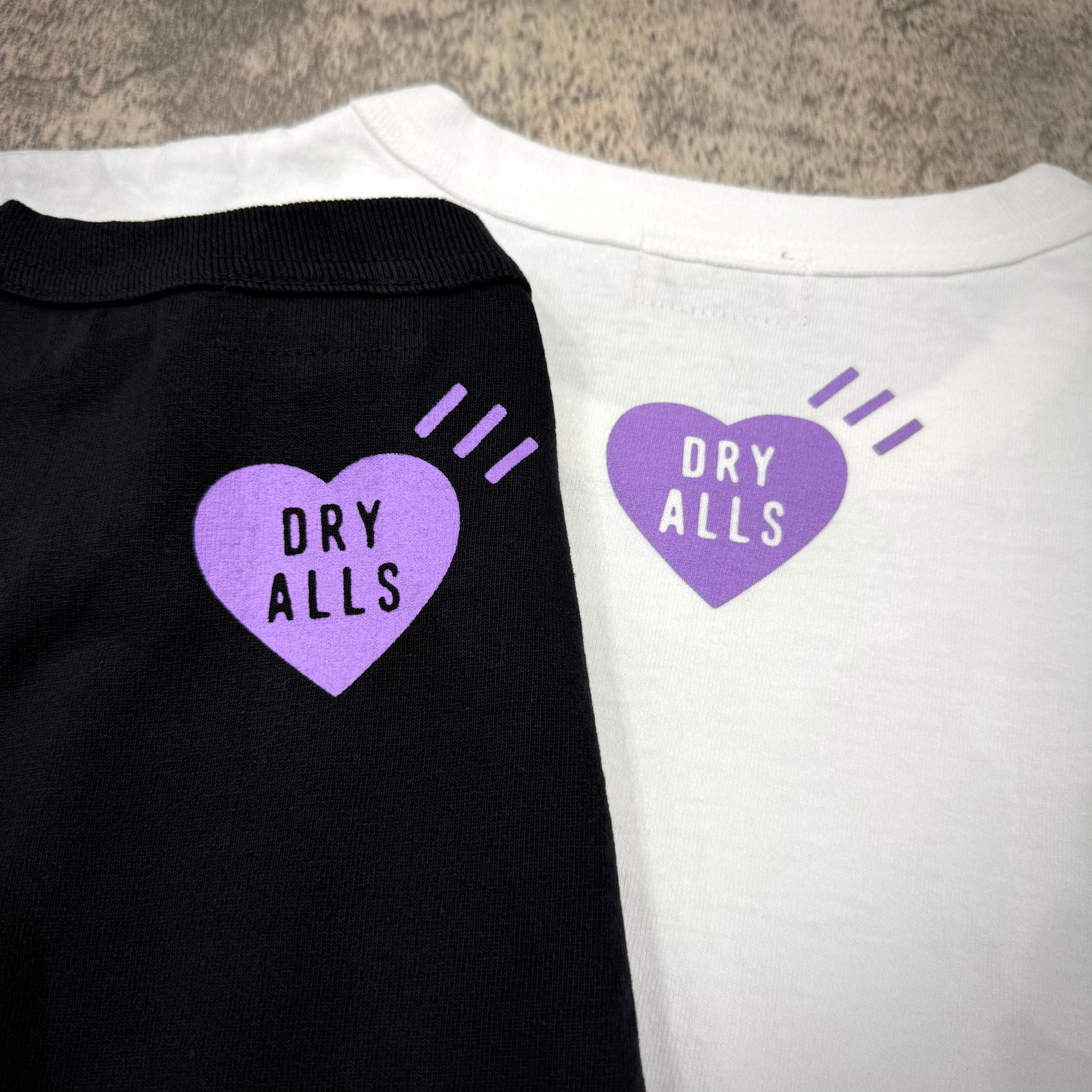 Human Made Apgujeong Exclusive Heart Logo Tee featuring heart logo on black and white tees.