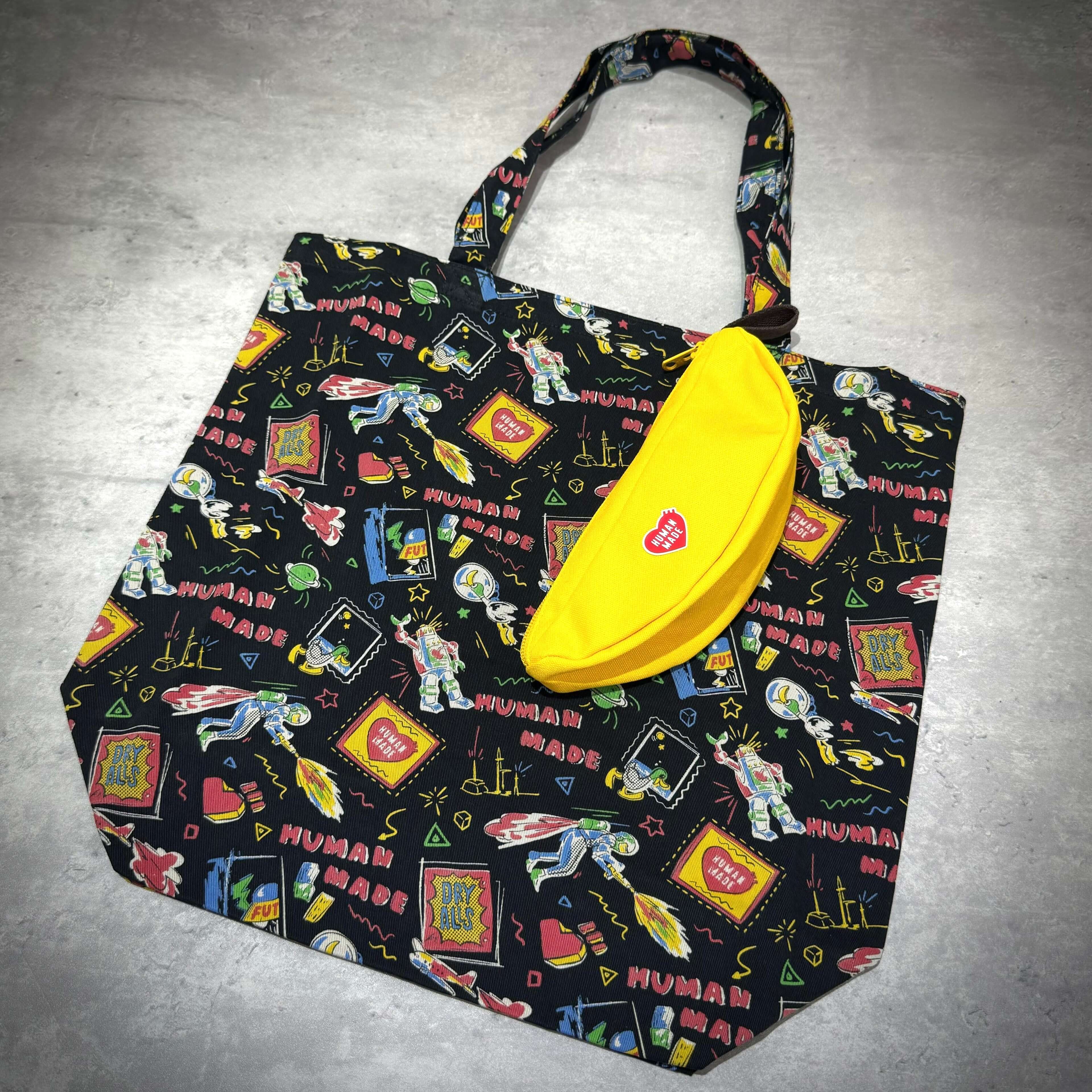 Human Made Banana Pouch in yellow, featured with colorful tote bag design, showcasing authenticity and unique style.
