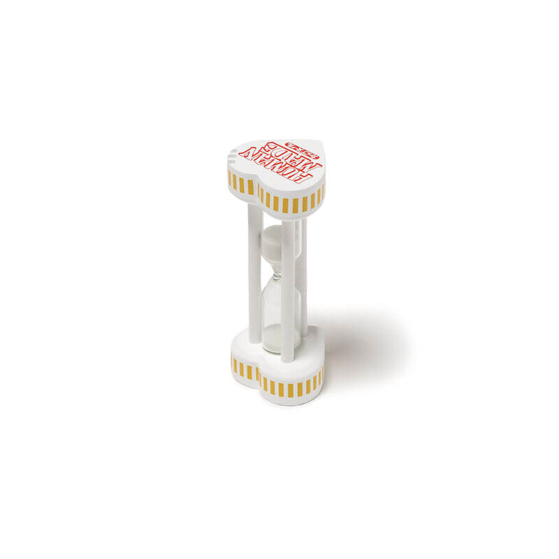 Human Made Cup Noodle 3 Minutes Hourglass displayed on a white background, designed with a playful aesthetic.