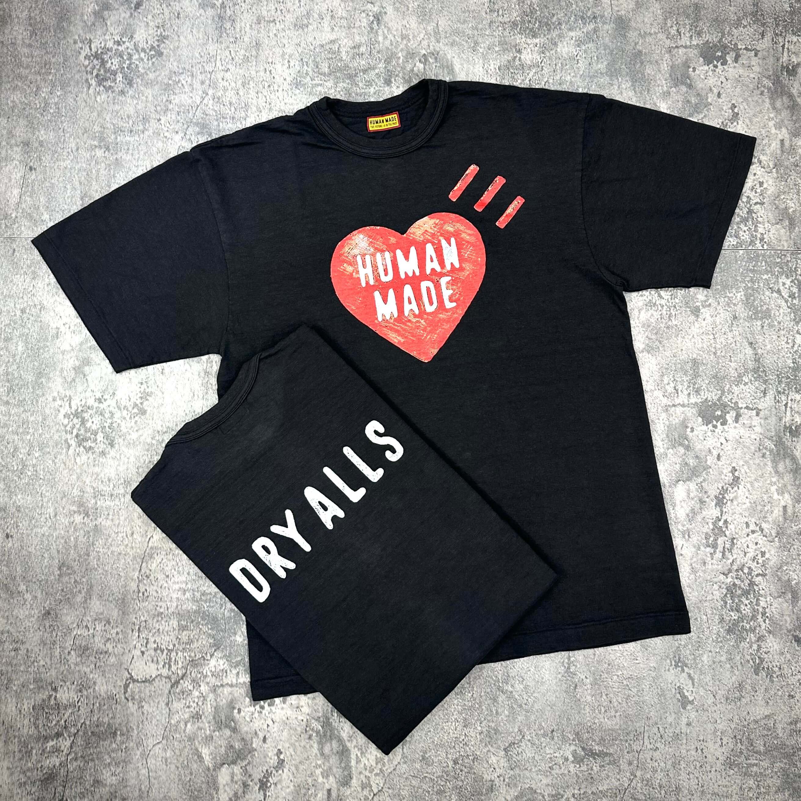 Human Made Heart Logo Tee FW25 in black with red heart logo and DRY ALLS text on back.