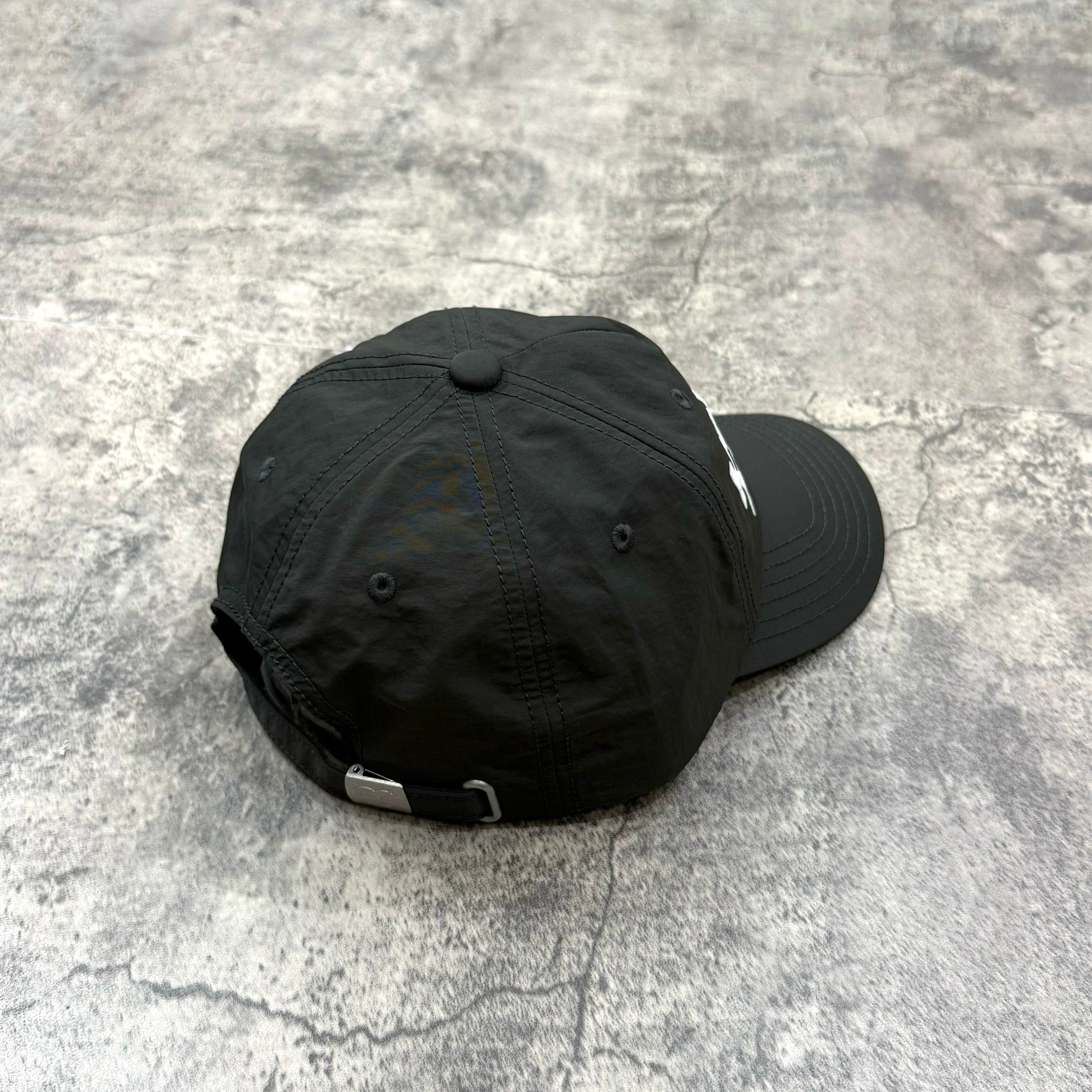 Human Made Jamsil Exclusive 6 Panel Nylon Cap view from the back on a gray textured background