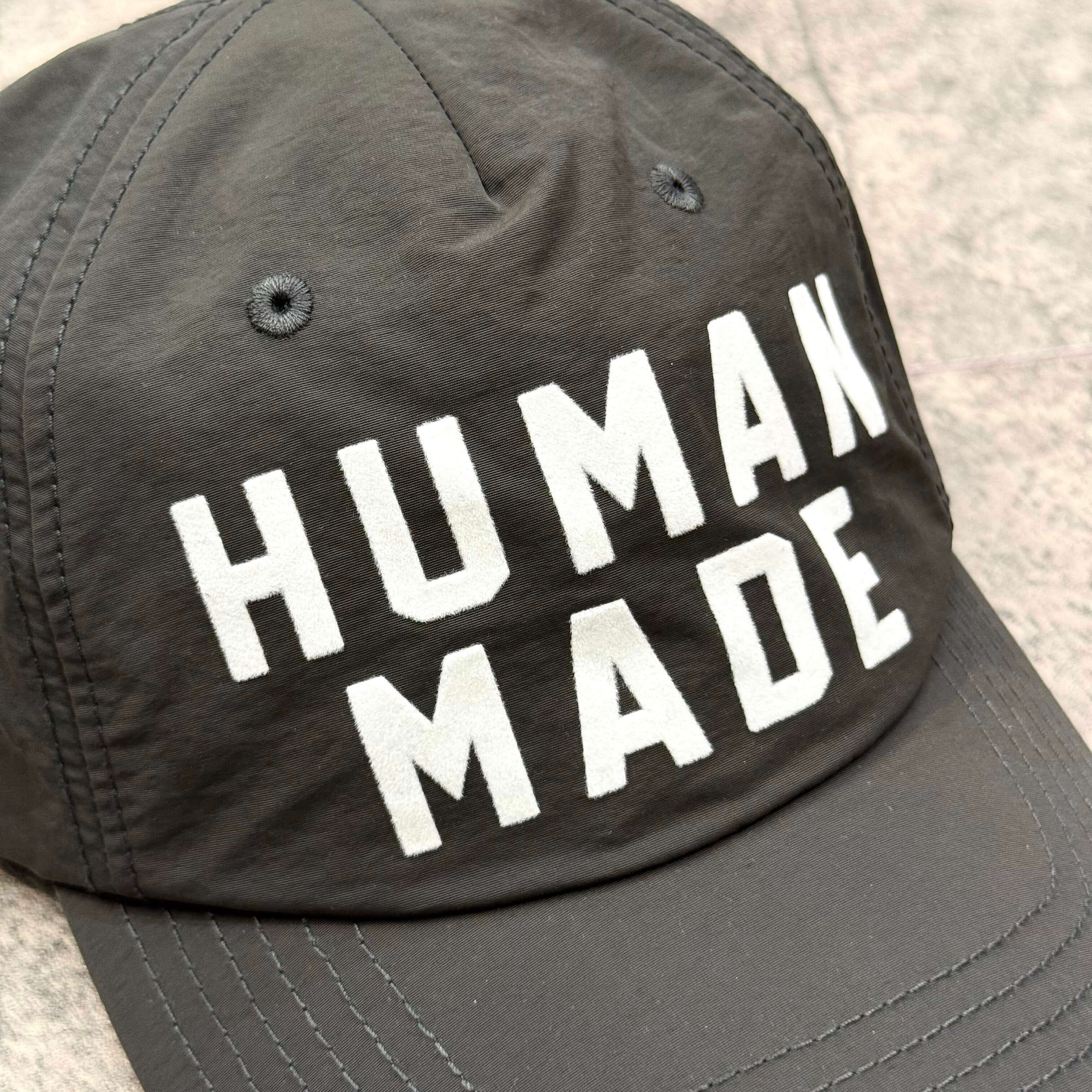 Human Made Jamsil Exclusive 6 Panel Nylon Cap showing the bold 'HUMAN MADE' text on the front.