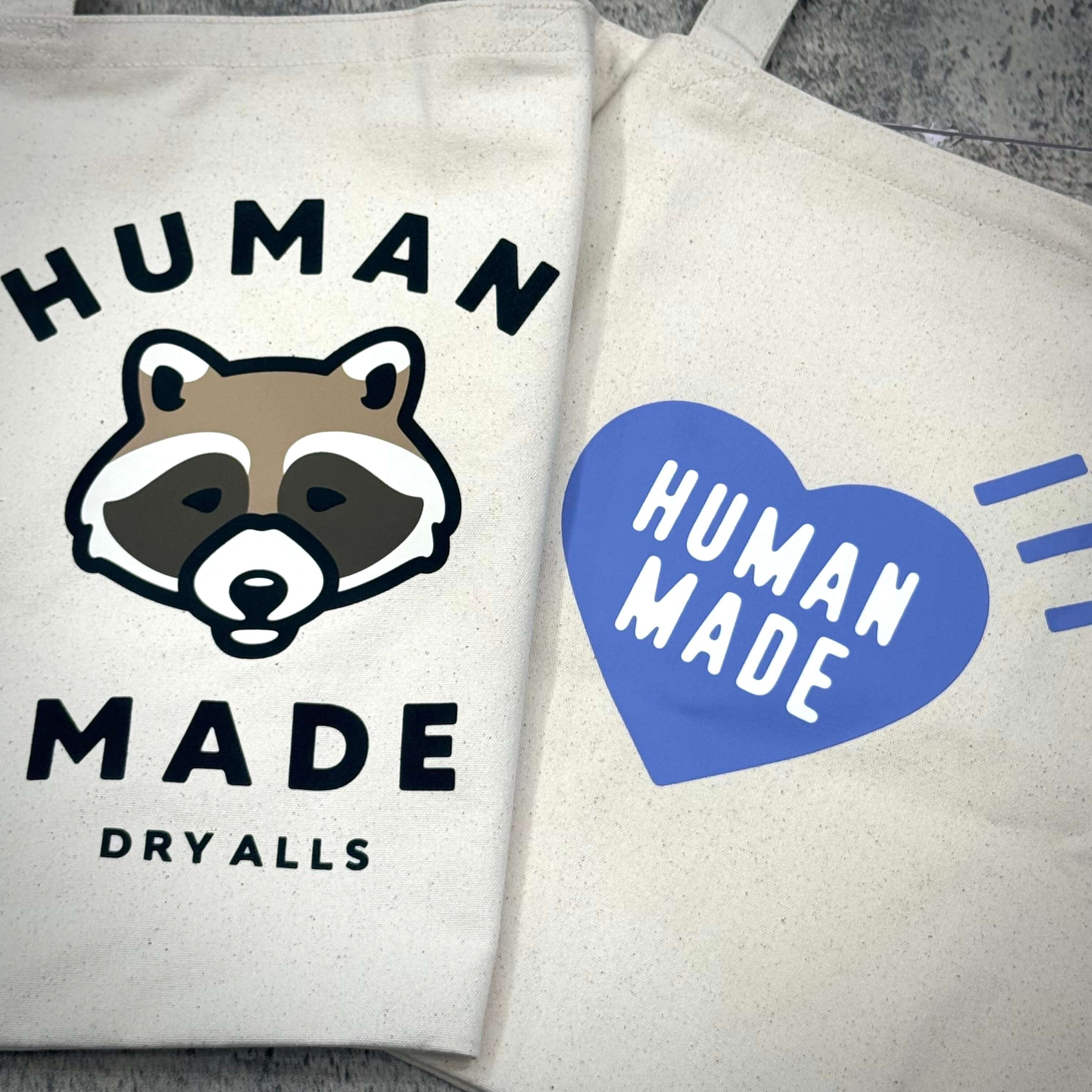 Human Made Jamsil Exclusive Book Tote featuring raccoon design and heart graphic.