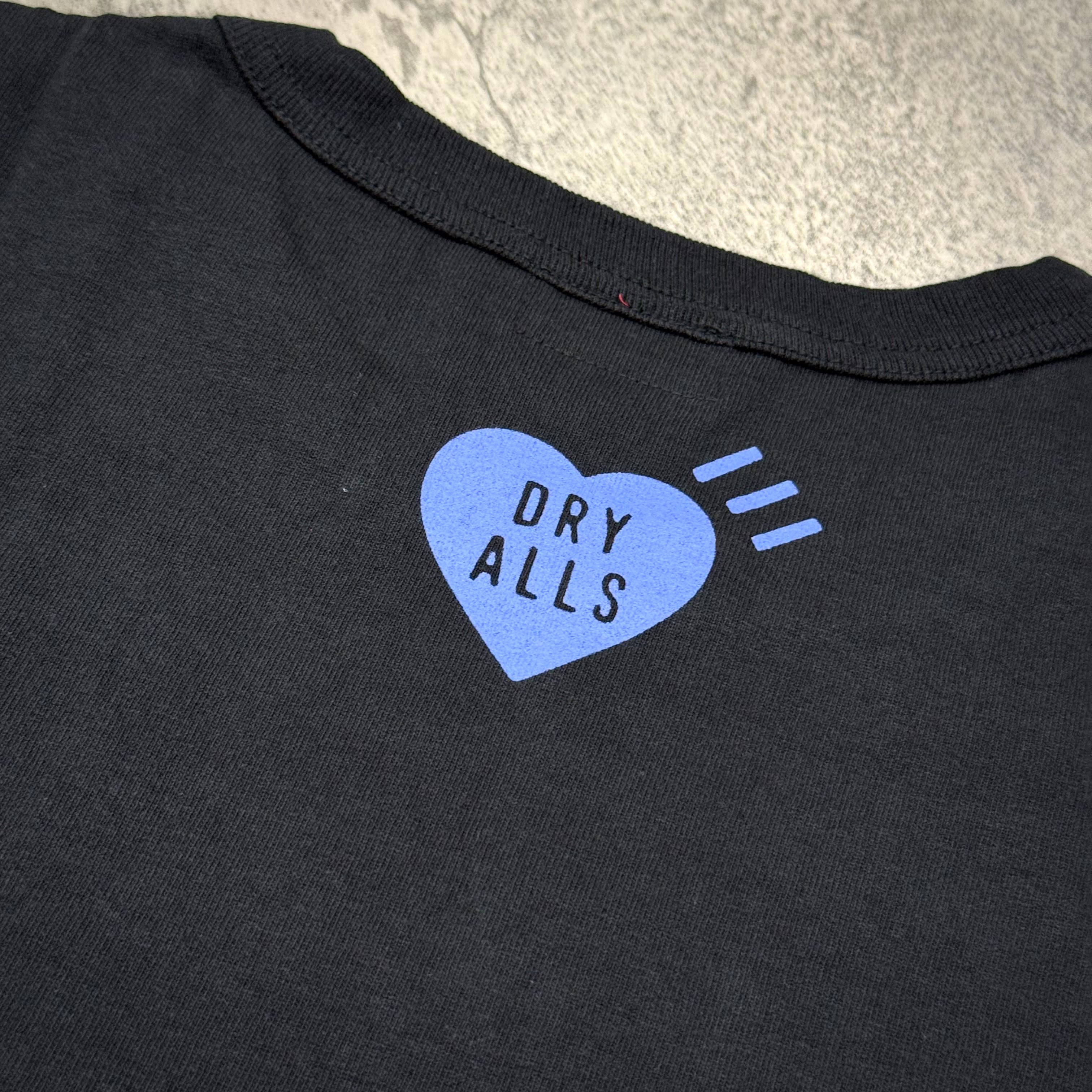 Human Made Jamsil Exclusive Heart Logo Tee with blue heart graphic and text 'DRY ALLS' on the back.