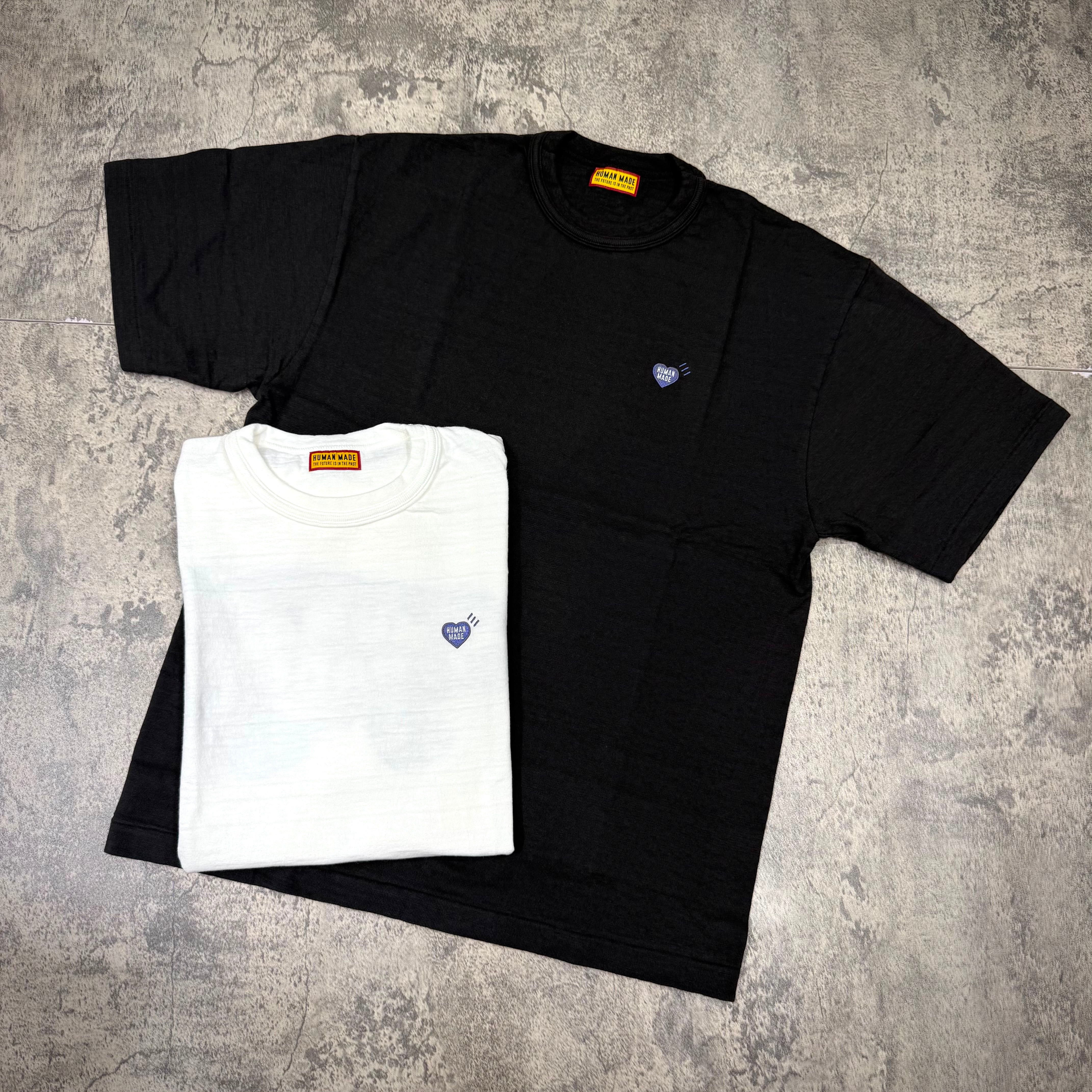 Human Made Jamsil Exclusive Raccon Back Logo Tee in black and white displayed; stylish and unique design.