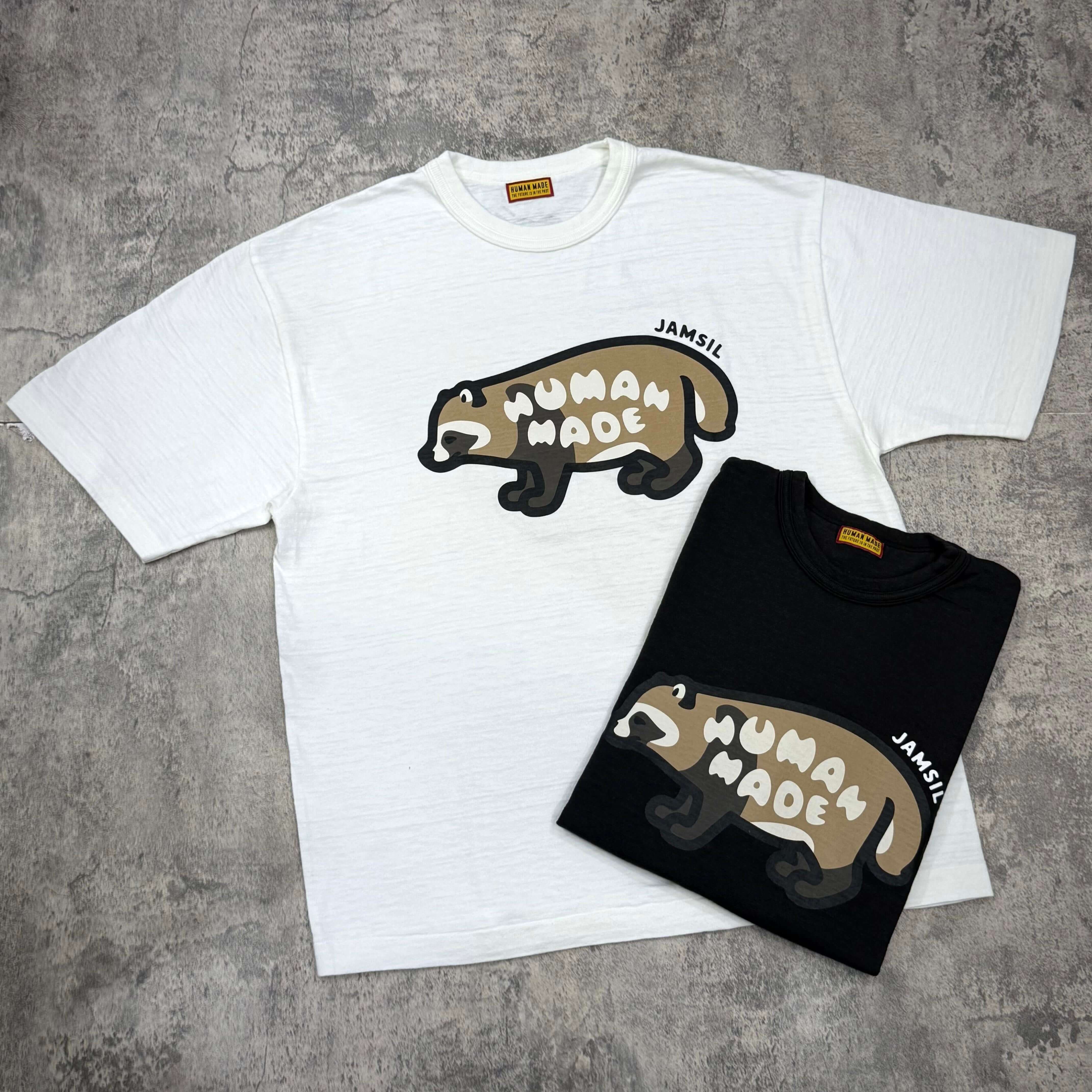 Human Made Jamsil Exclusive Raccon Tee displayed in white and black colors on a gray background