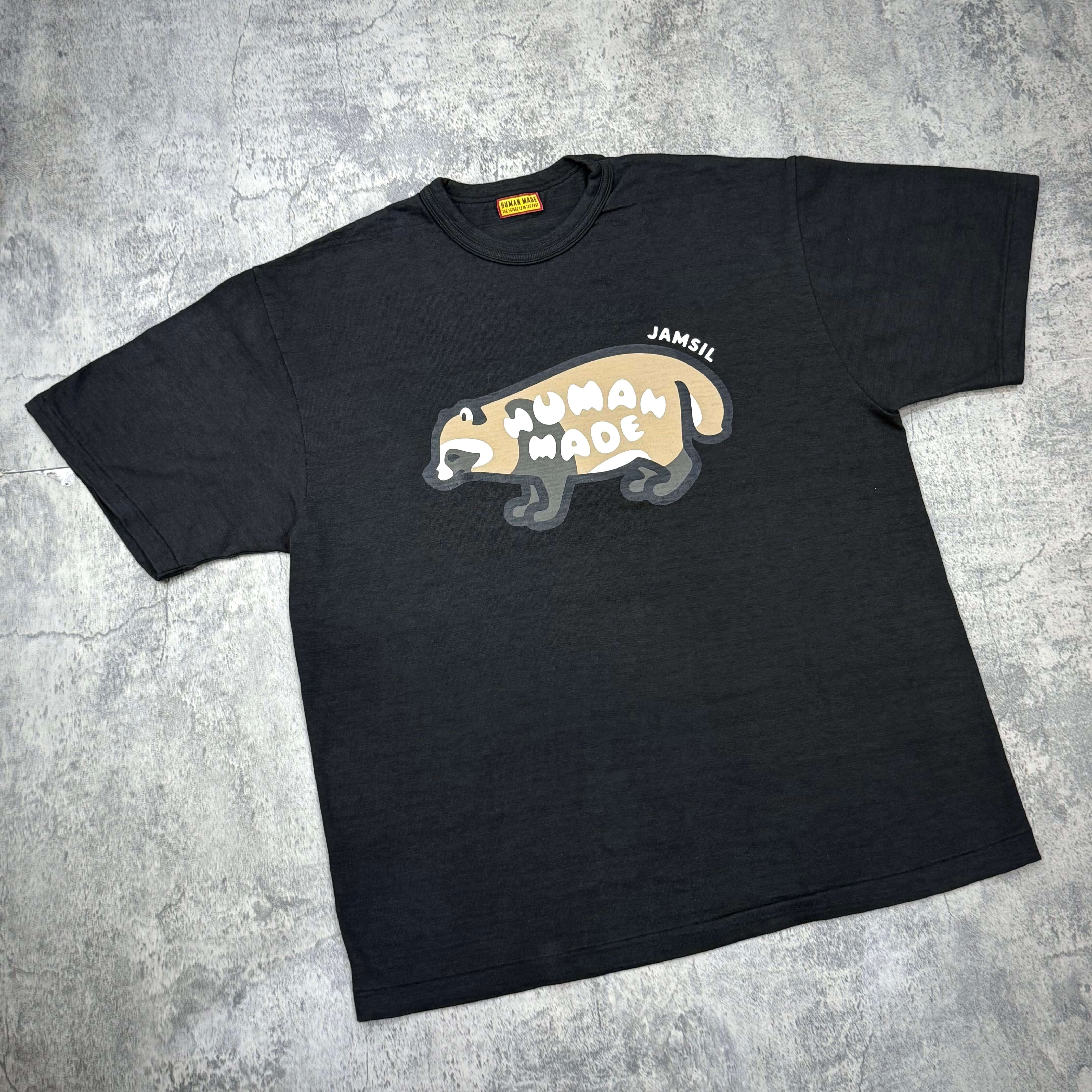 Human Made Jamsil Exclusive Raccon Tee featuring a raccoon graphic design on a black t-shirt.