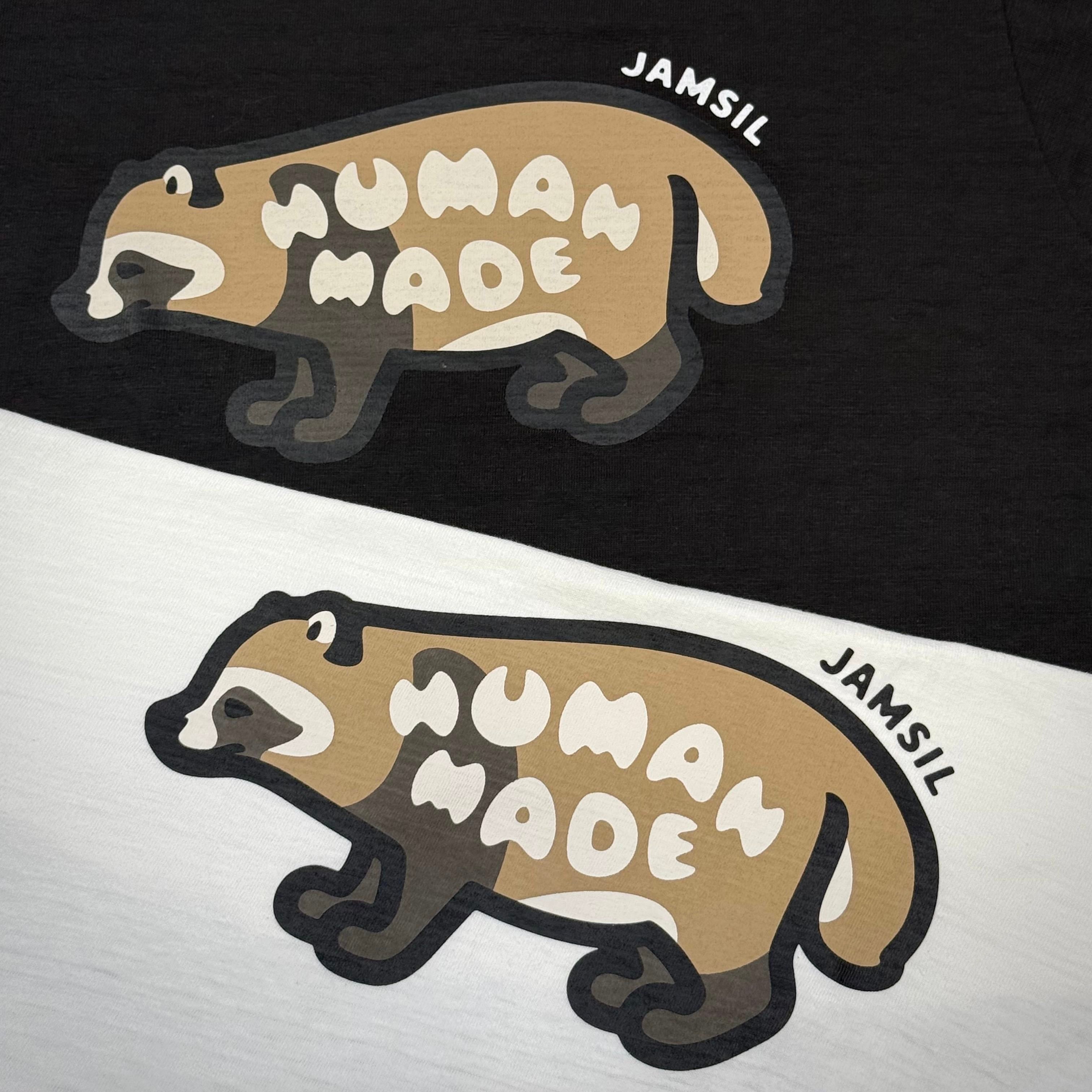 Human Made Jamsil Exclusive Raccon Tee featuring a raccoon graphic design on black and white fabric.