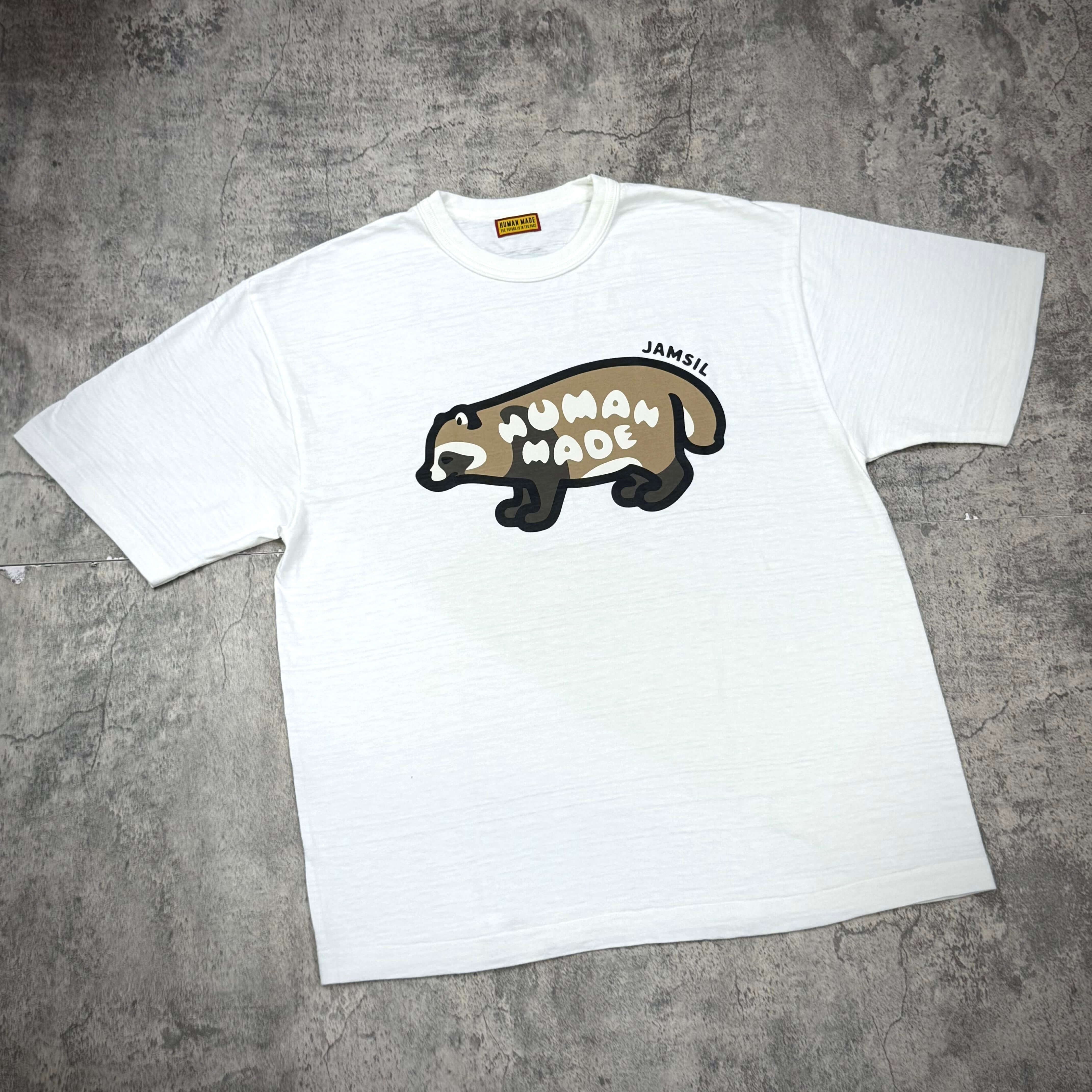 Human Made Jamsil Exclusive Raccon Tee featuring a raccoon graphic and the brand name on a white t-shirt.