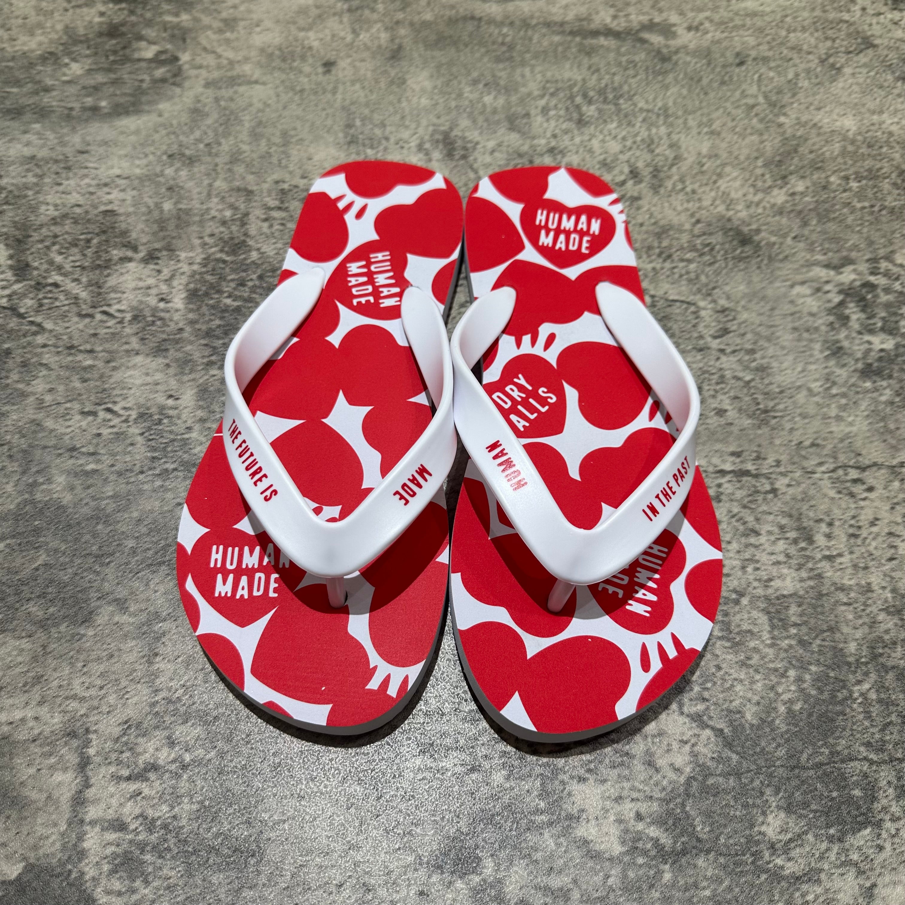 Human Made Sandal with a bold red and white design featuring the brand name on the straps.