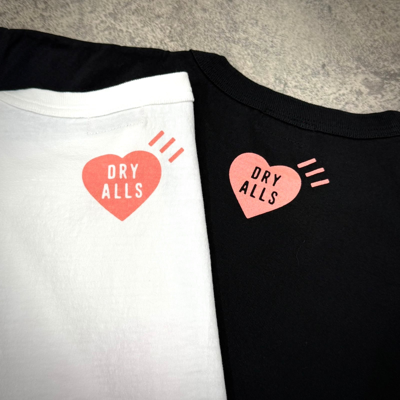 Human Made Seoul Exclusive Heart Logo Tee featuring heart logo on white and black tees