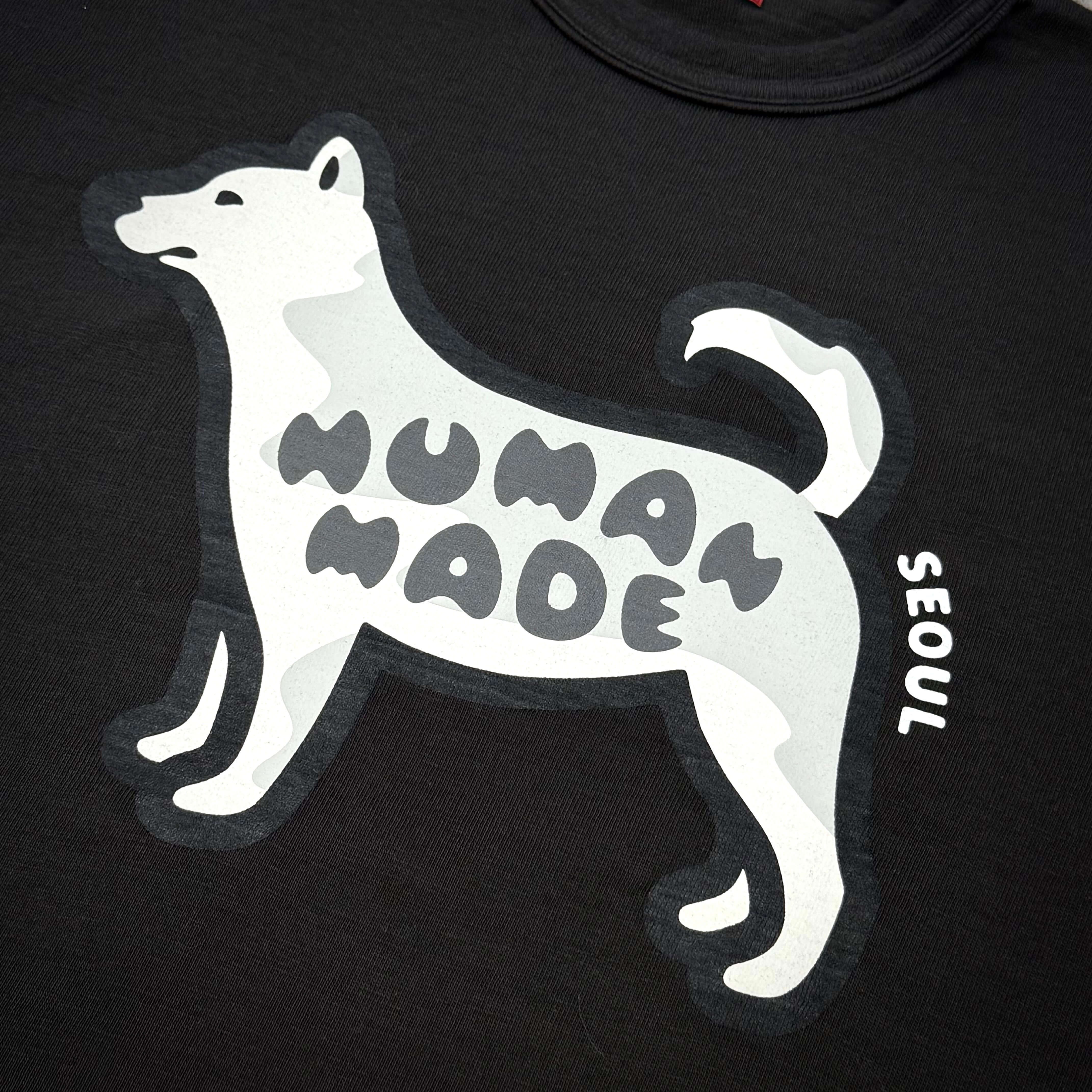 Human Made Seoul Opening Exclusive Jindo Dog Tee featuring a graphic of a dog in white and gray on a black background.